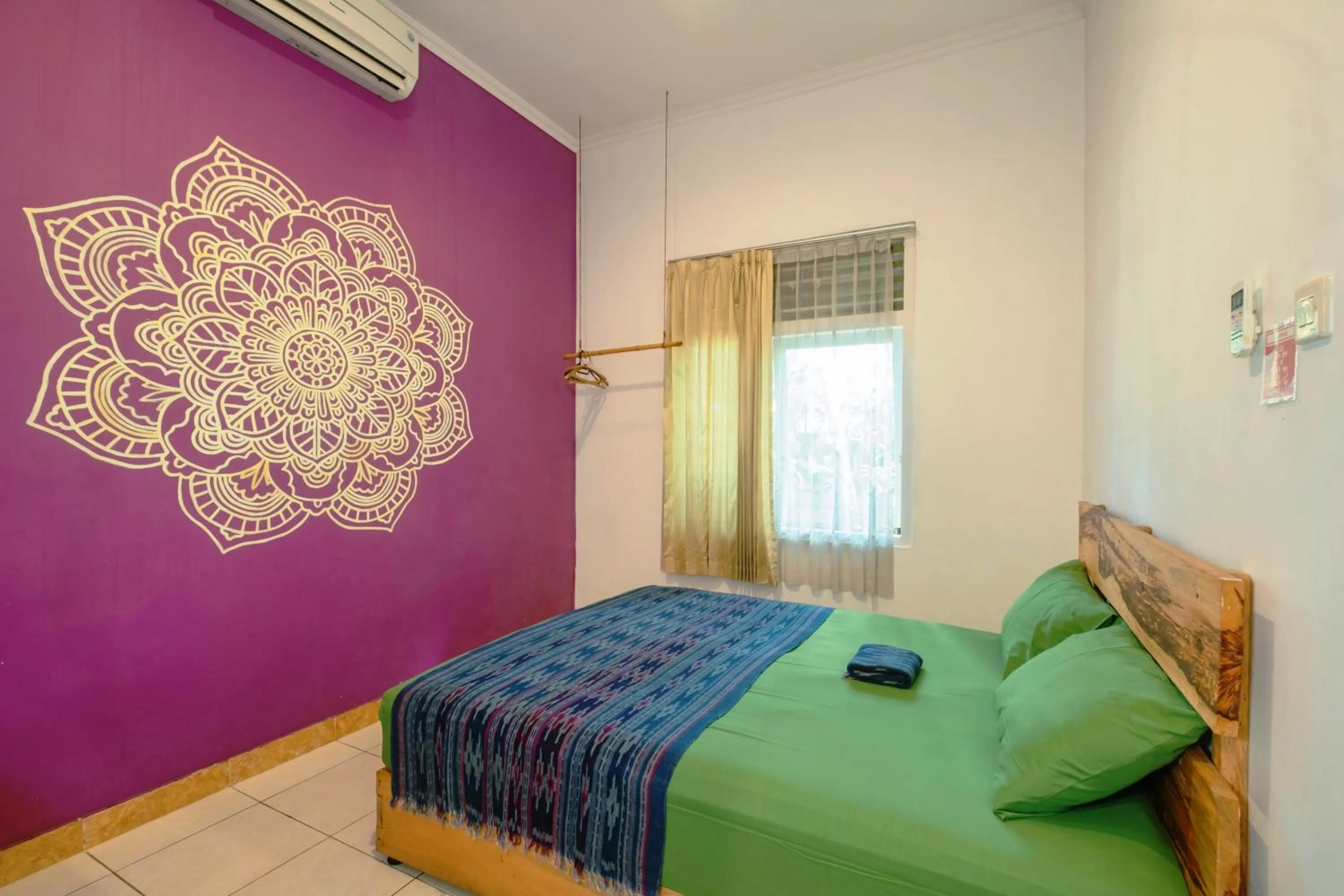 air conditioner, Bed in Happy Buddha Yogyakarta
