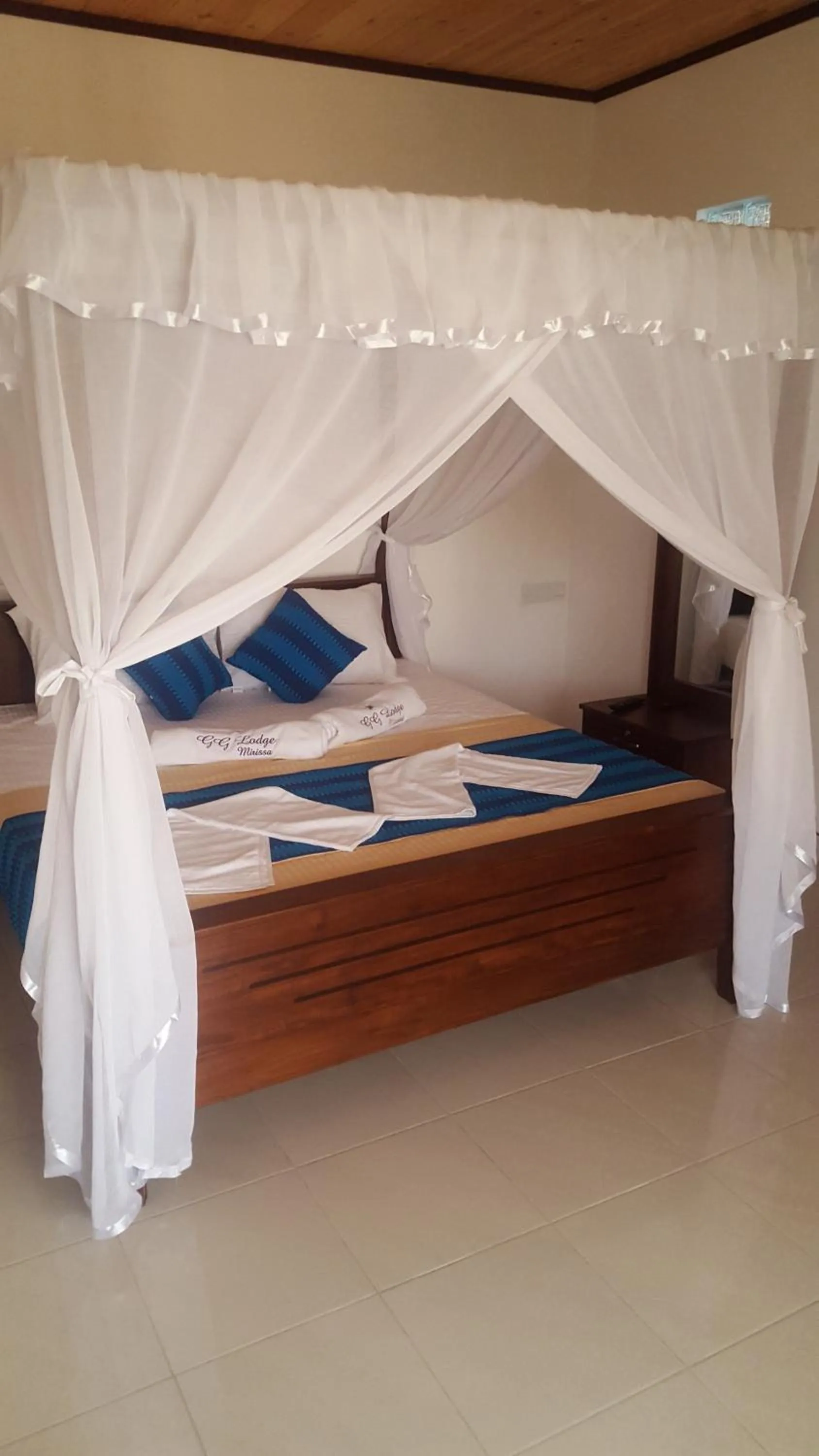 Property building, Bed in GG Lodge Mirissa