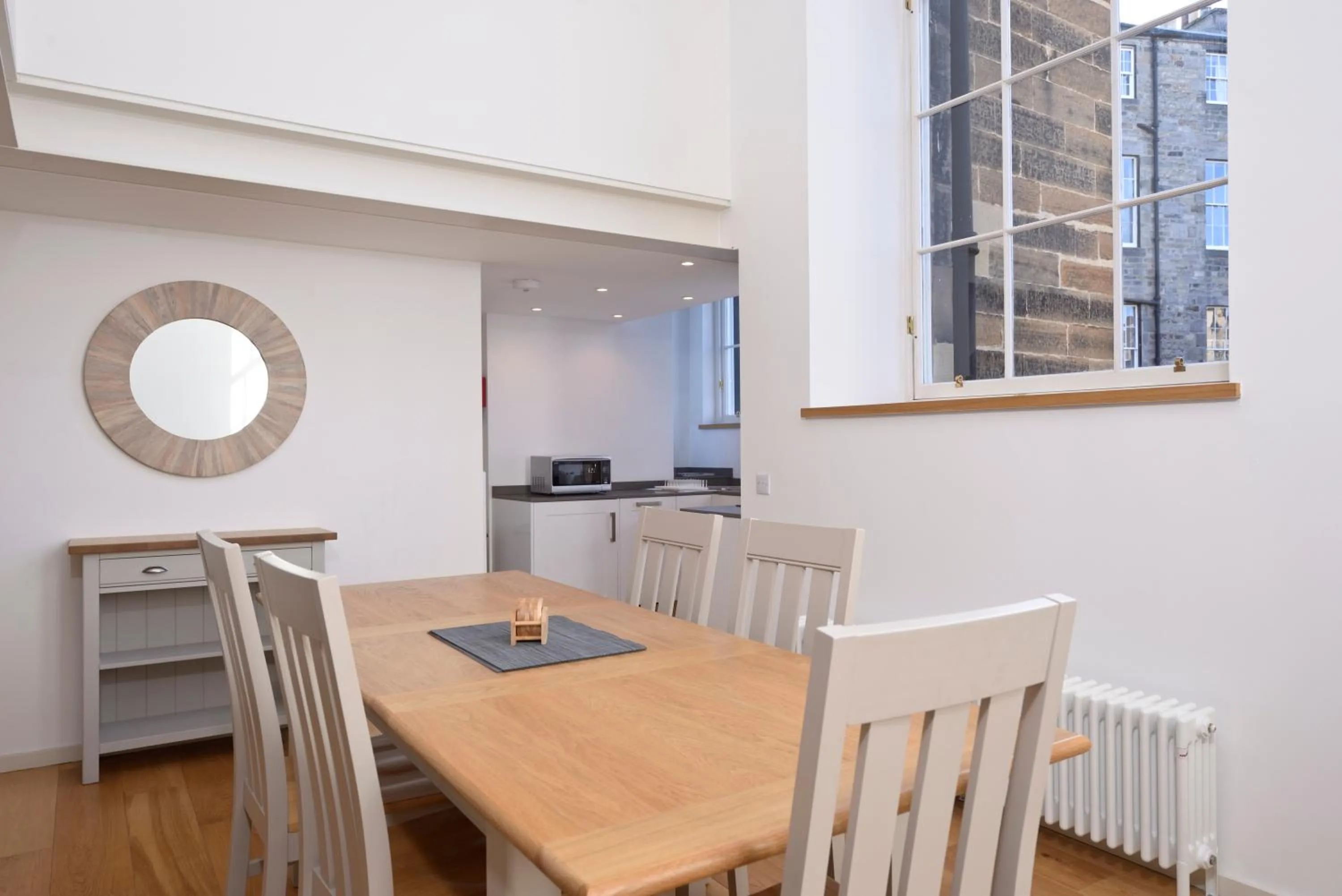 Dining area in Destiny Scotland - Broughton St Lofts