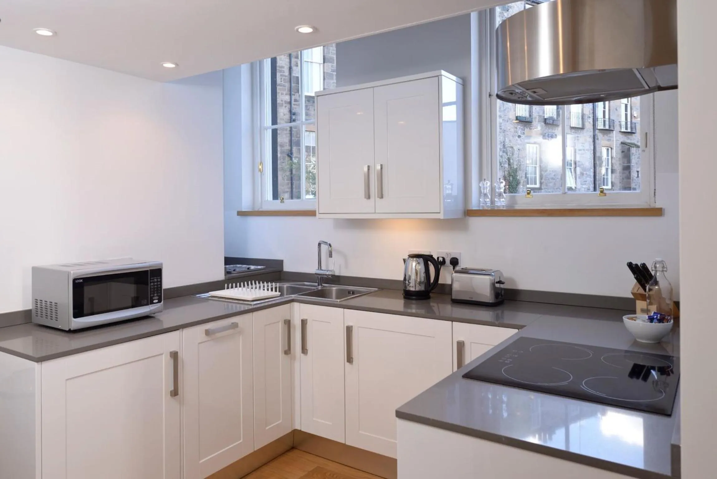 Kitchen or kitchenette in Destiny Scotland - Broughton St Lofts