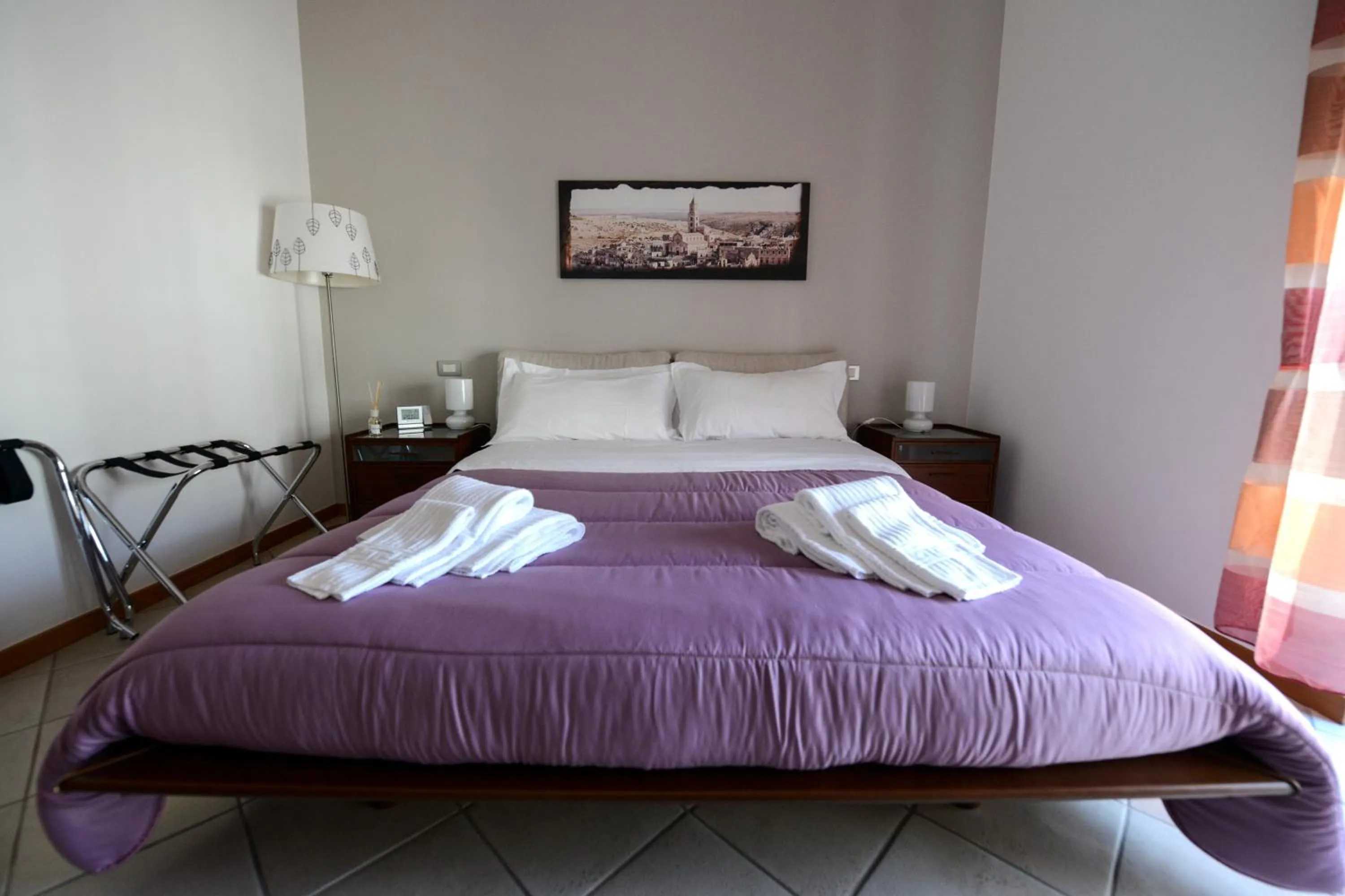 Photo of the whole room, Bed in Uno Sguardo Sui Sassi