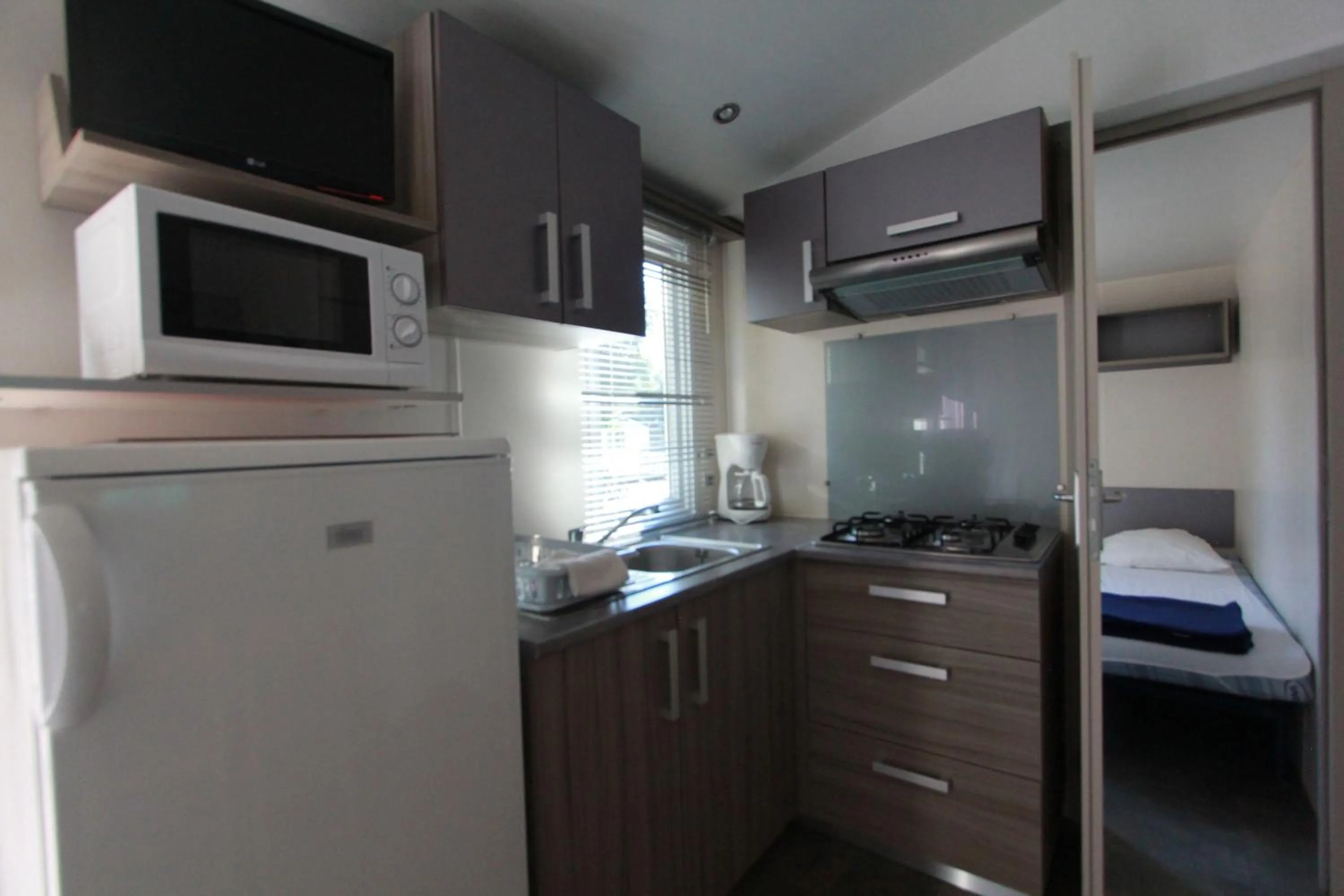 Kitchen or kitchenette in Camping Dolce Vita
