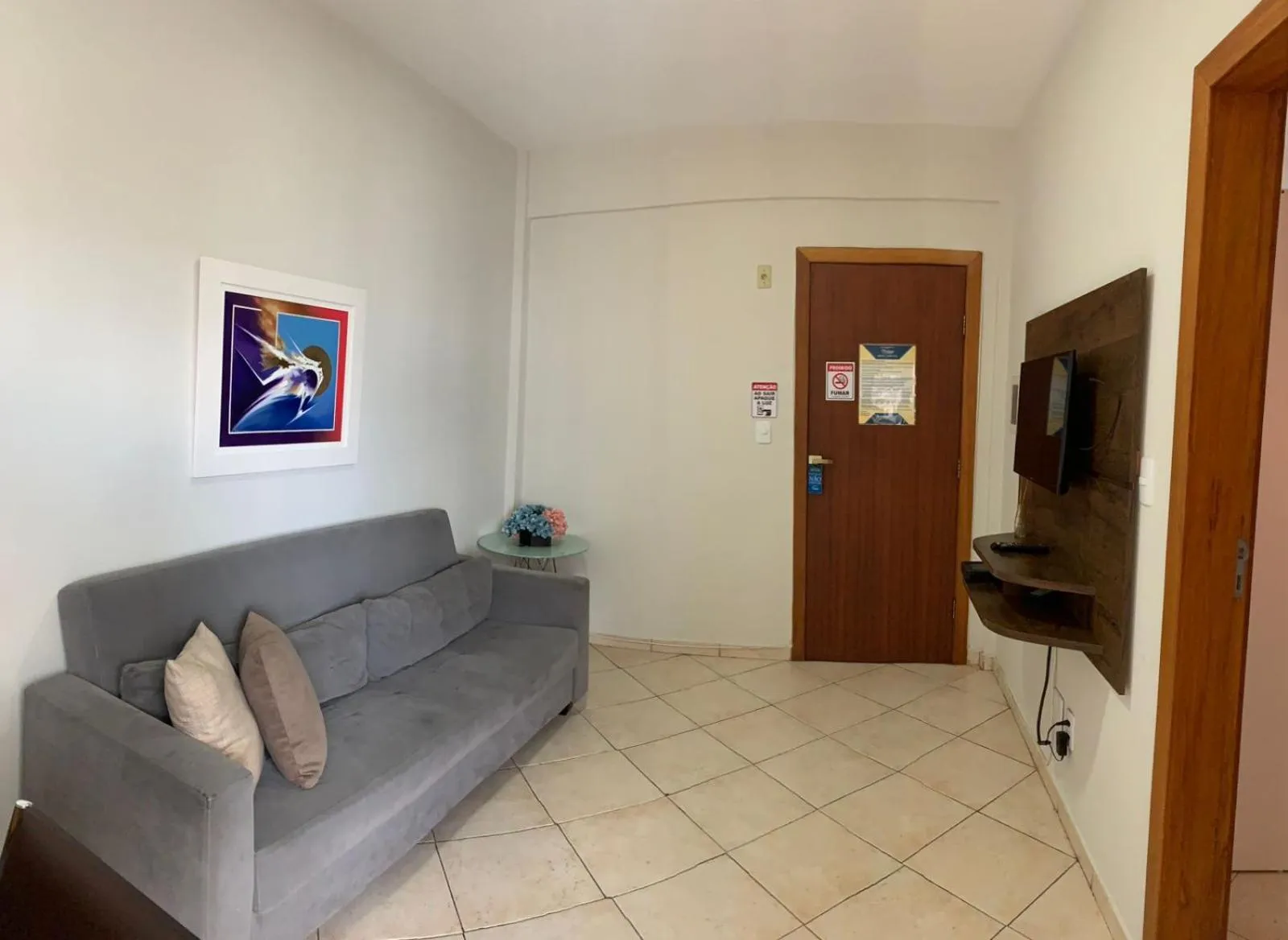 Communal lounge/ TV room in Apart Victoria