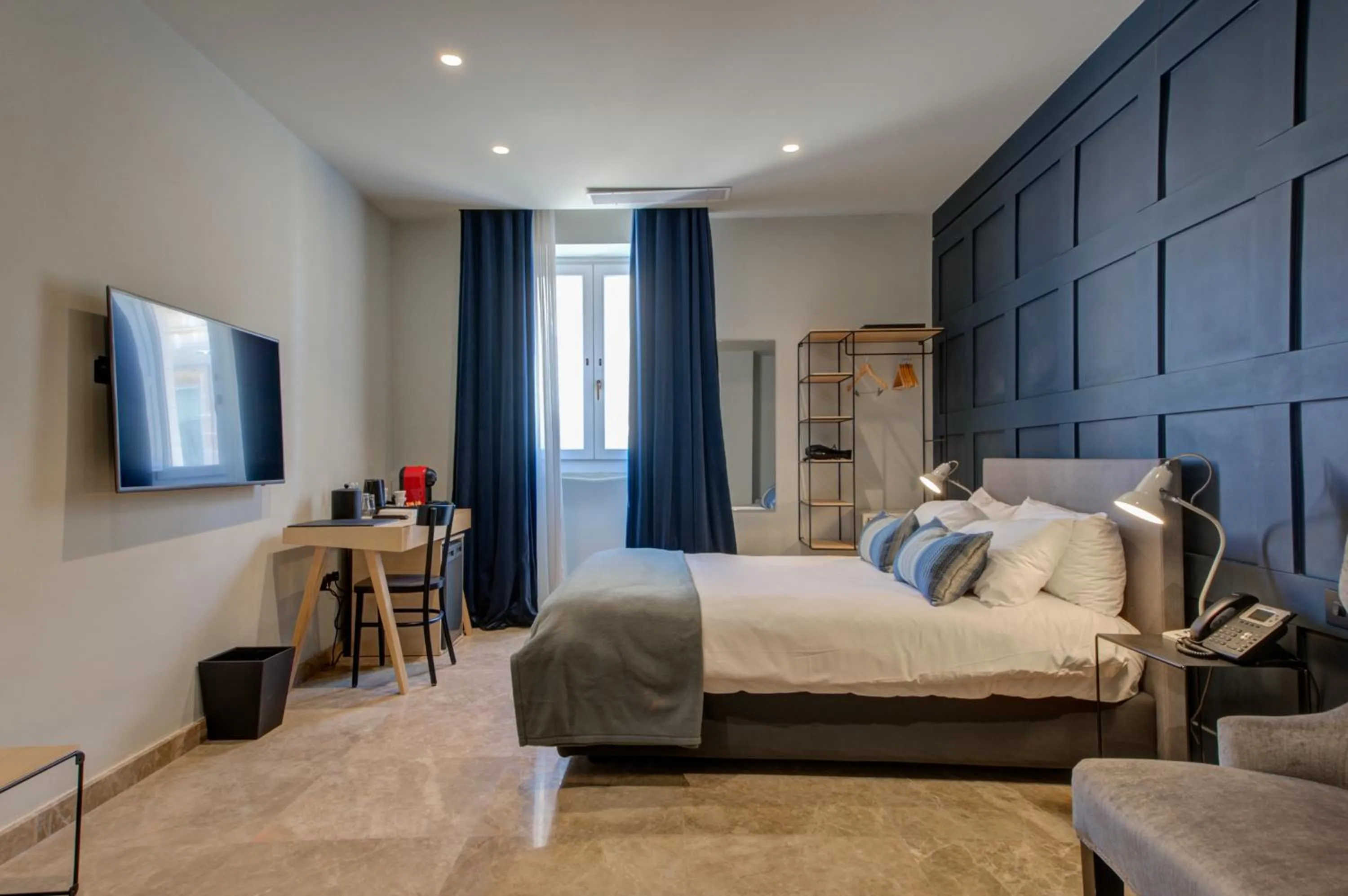 Bed in The Manoel Boutique Hotel