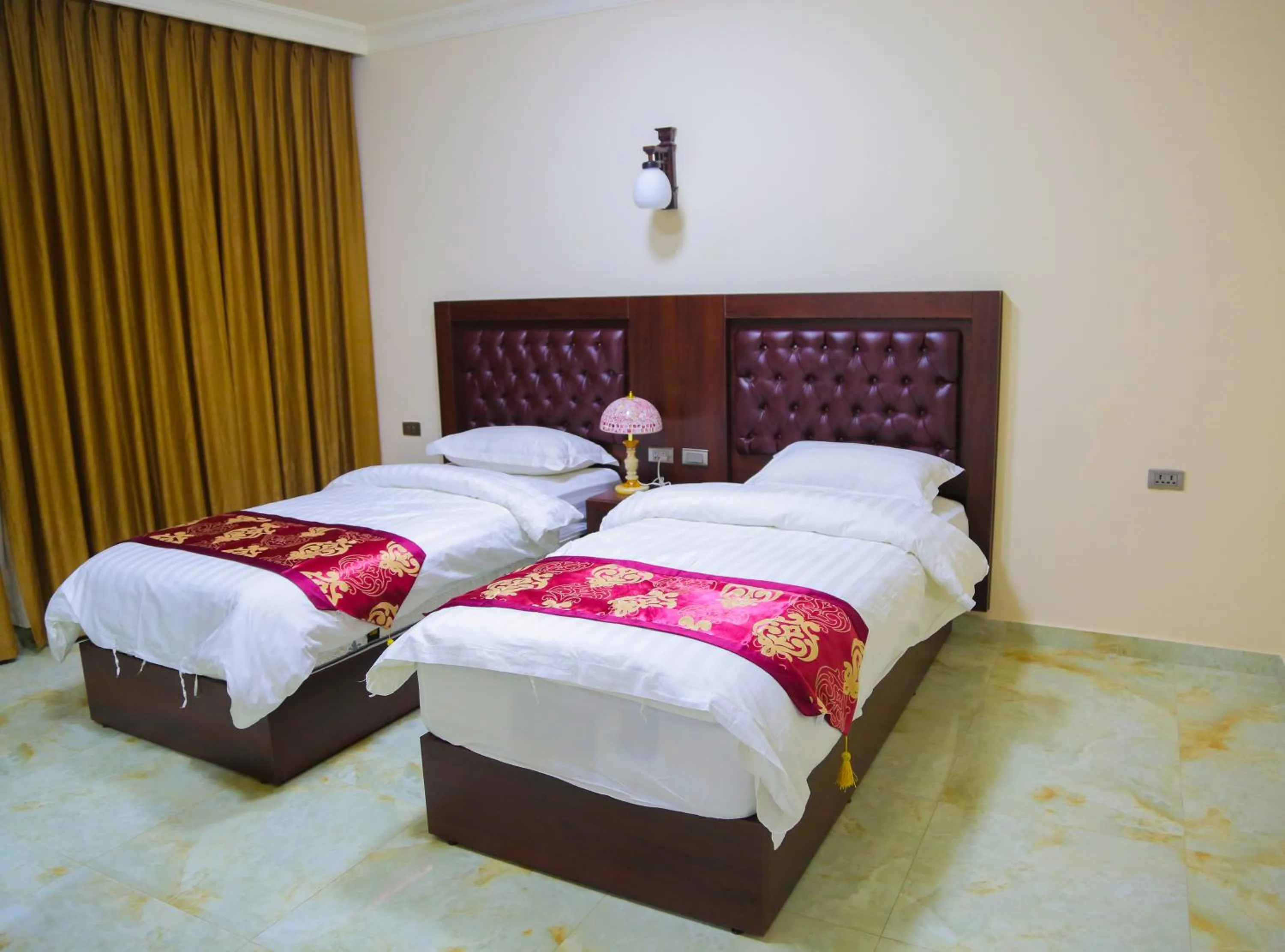 Photo of the whole room, Bed in Qaser Al-Sultan Hotel Suites