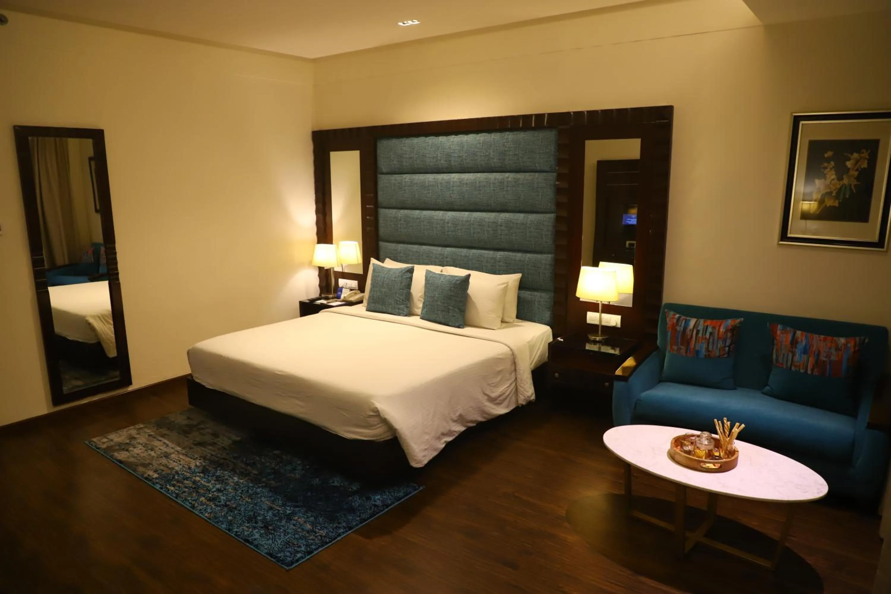 Bed in Deventure Sarovar Portico Kapashera, New Delhi
