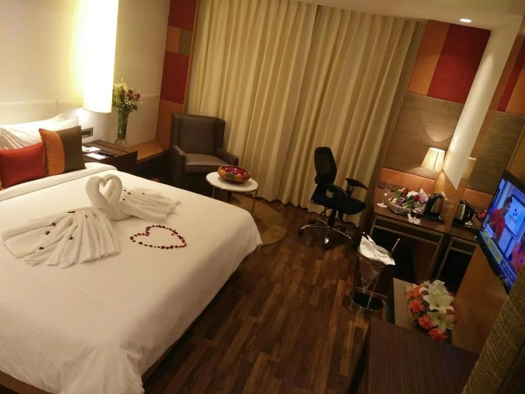 Bed in Deventure Sarovar Portico Kapashera, New Delhi