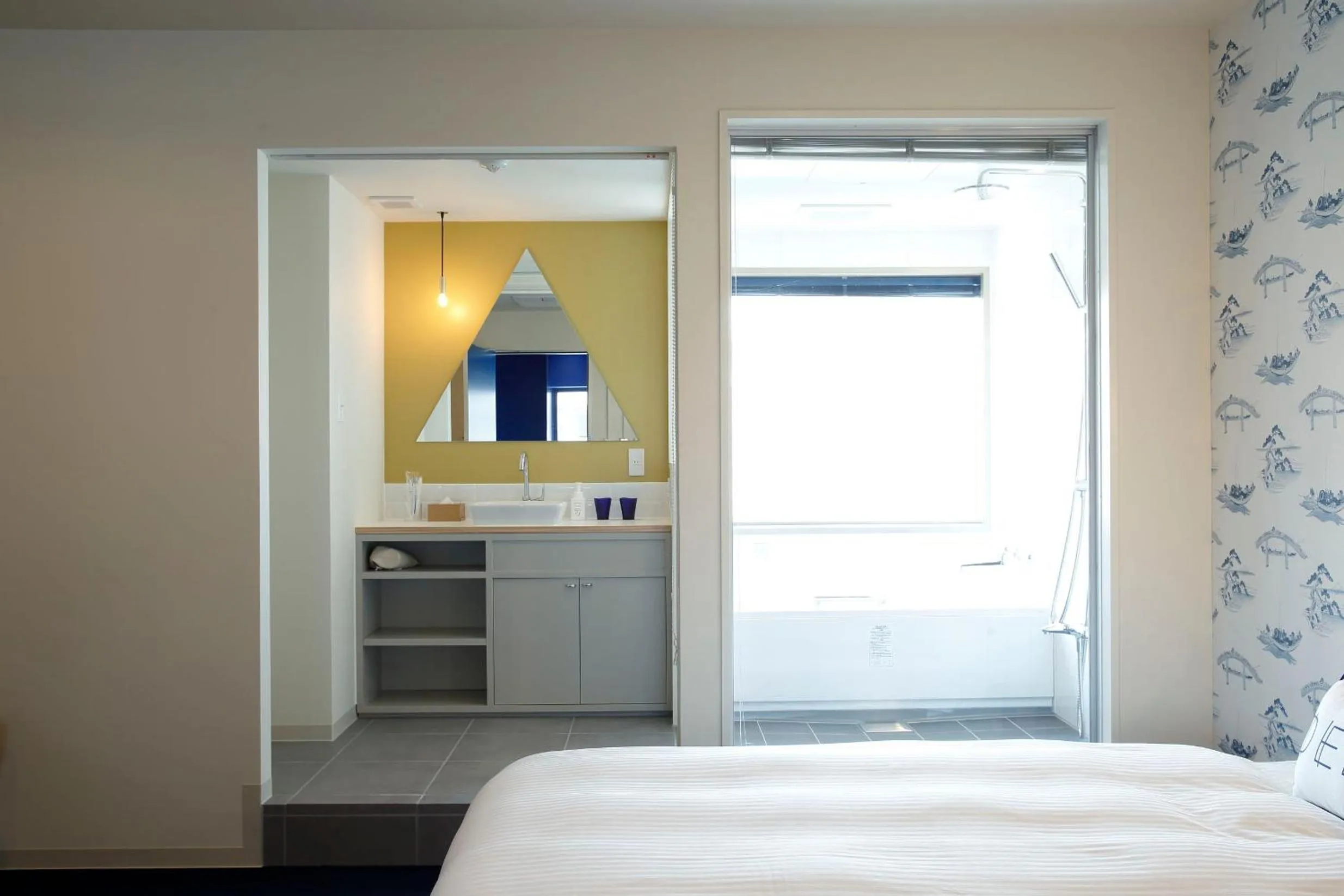 Photo of the whole room, Bed in LYURO Tokyo Kiyosumi by THE SHARE HOTELS