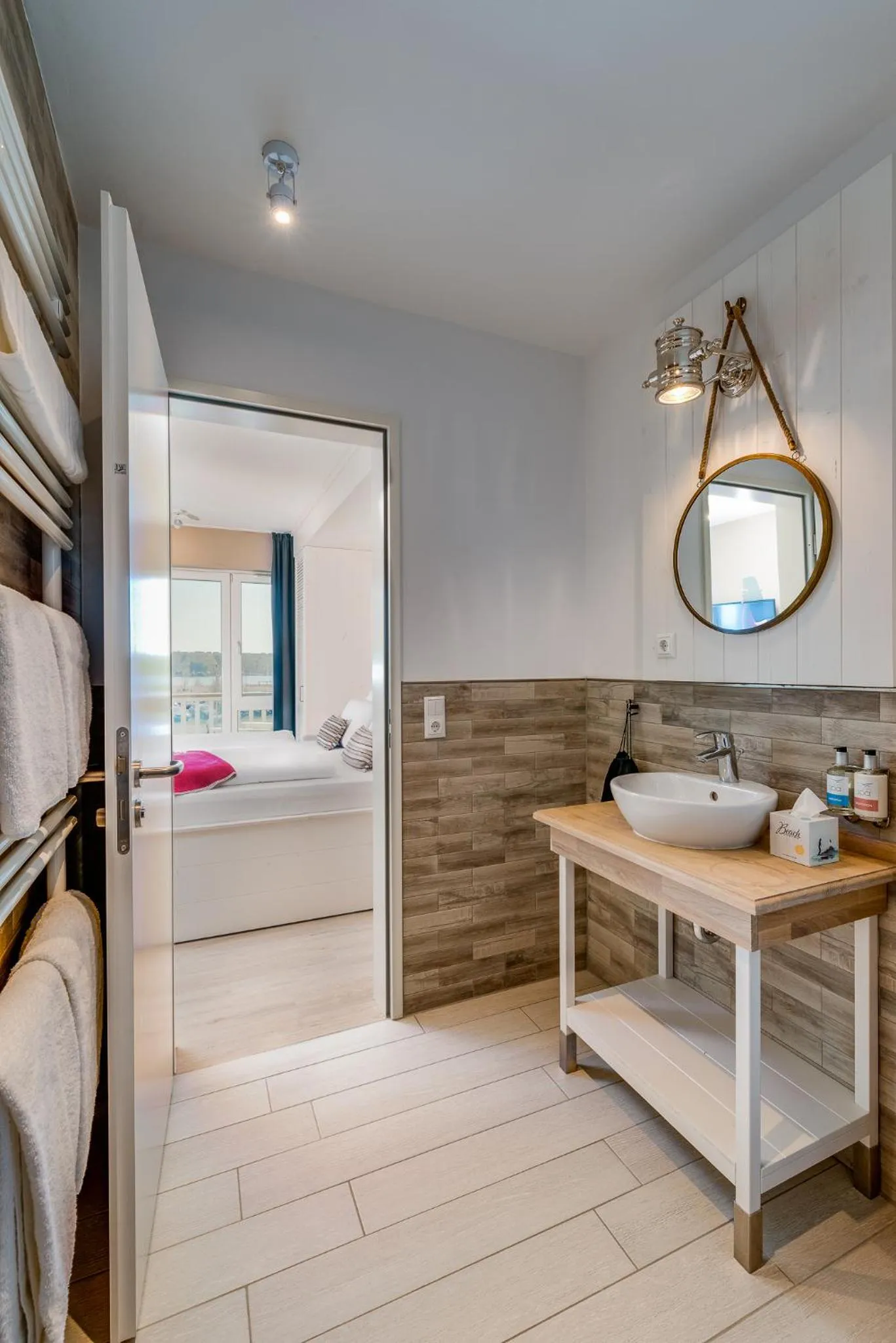 Bathroom, Bed in Beach Apartments Heiligenhafen