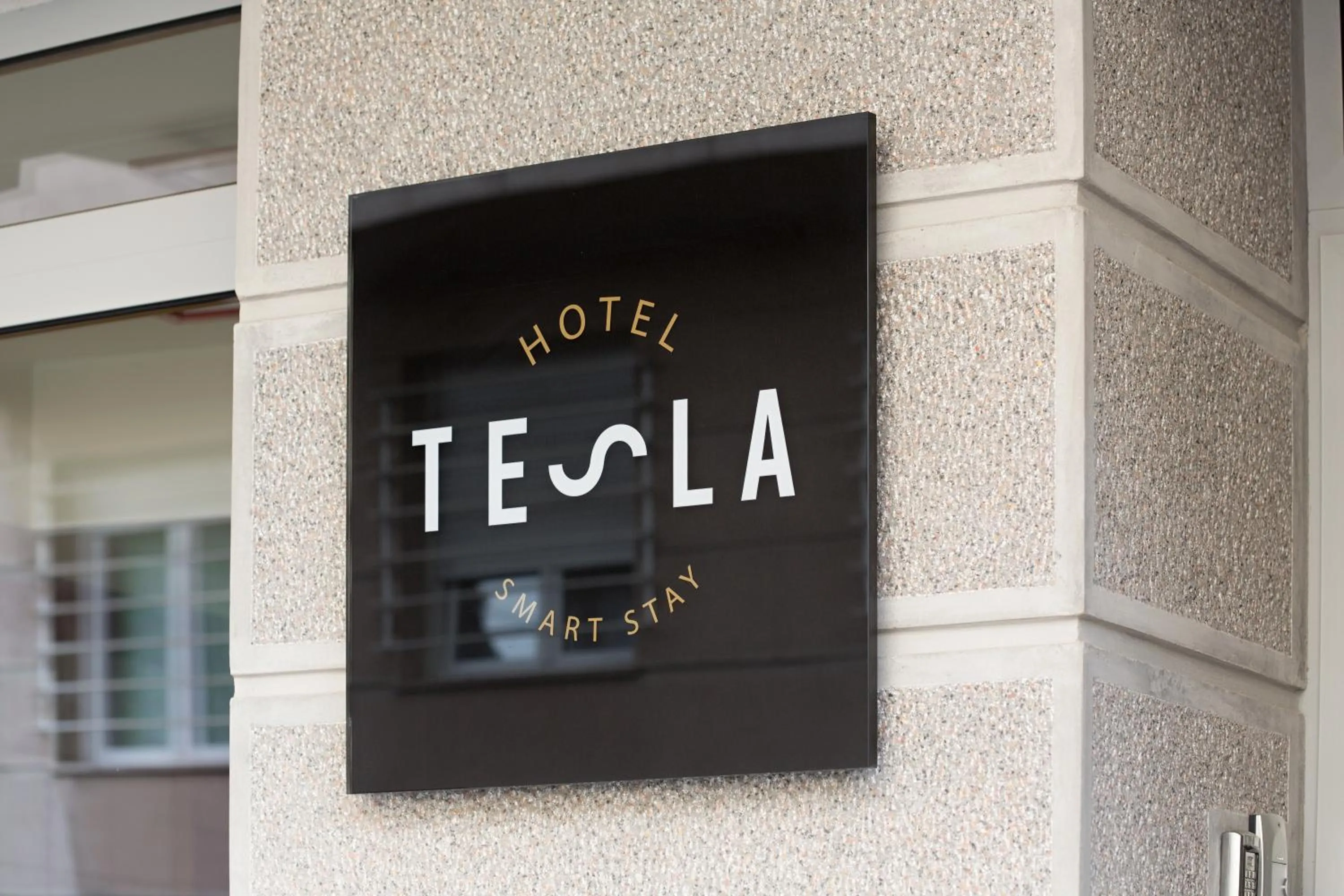 Property logo or sign in Hotel TESLA - Smart Stay Garni