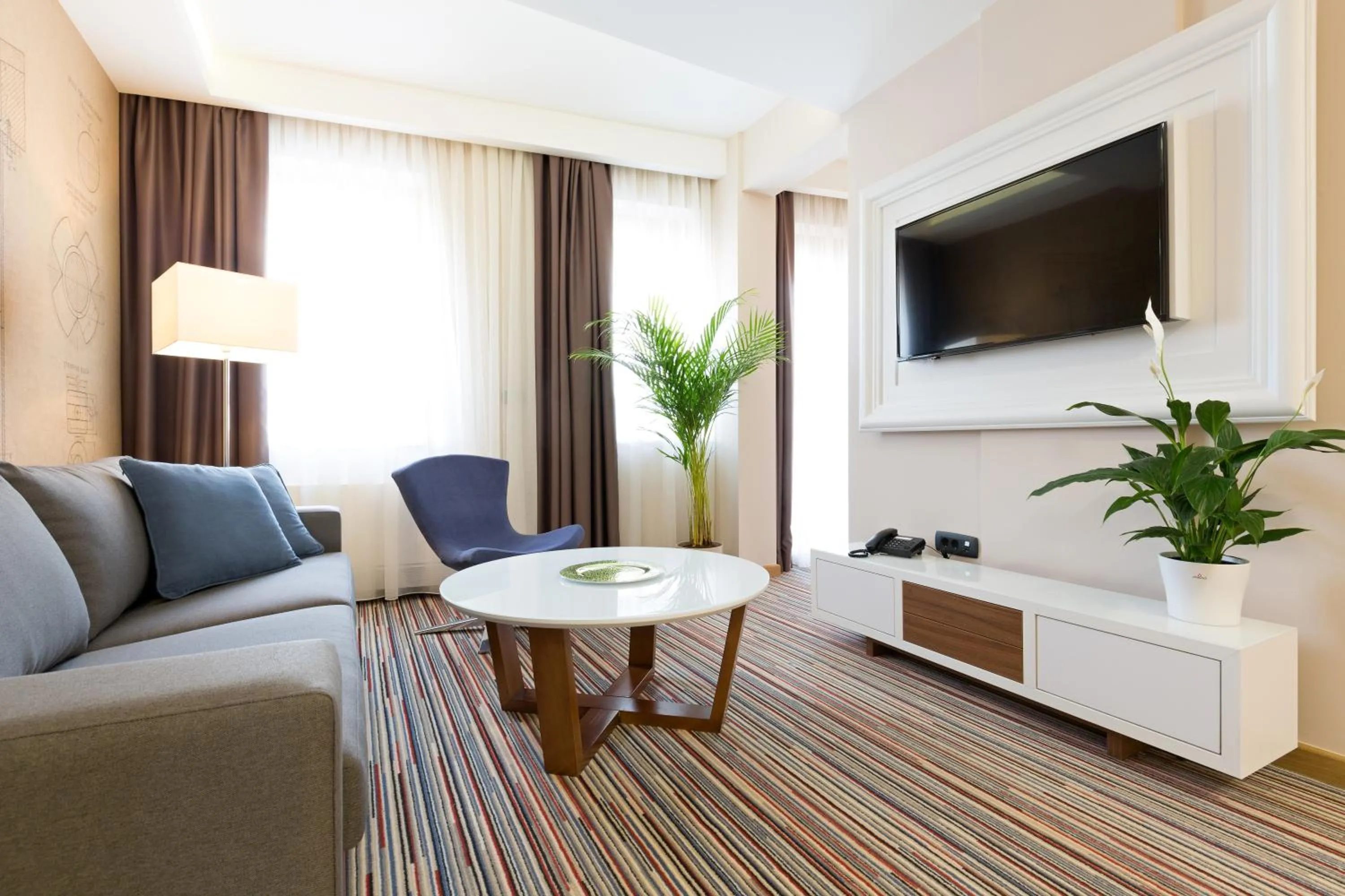 Living room in Hotel TESLA - Smart Stay Garni