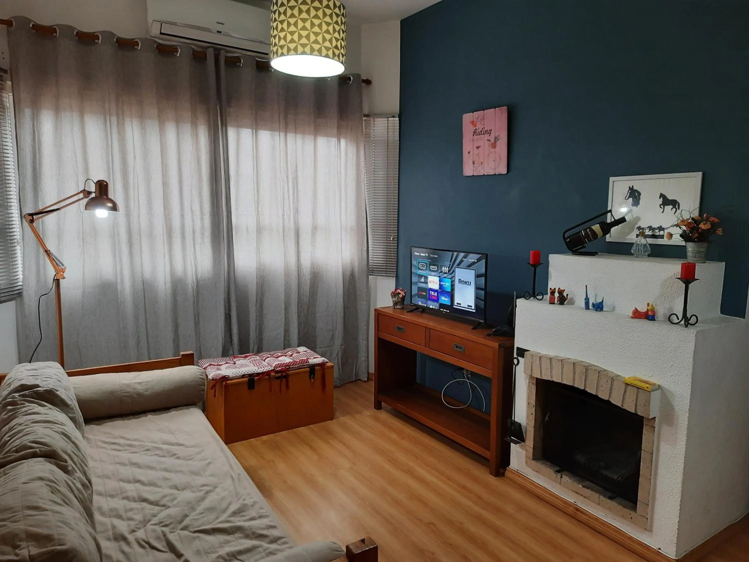 Communal lounge/ TV room in Apartamento Lago Grande Hotel