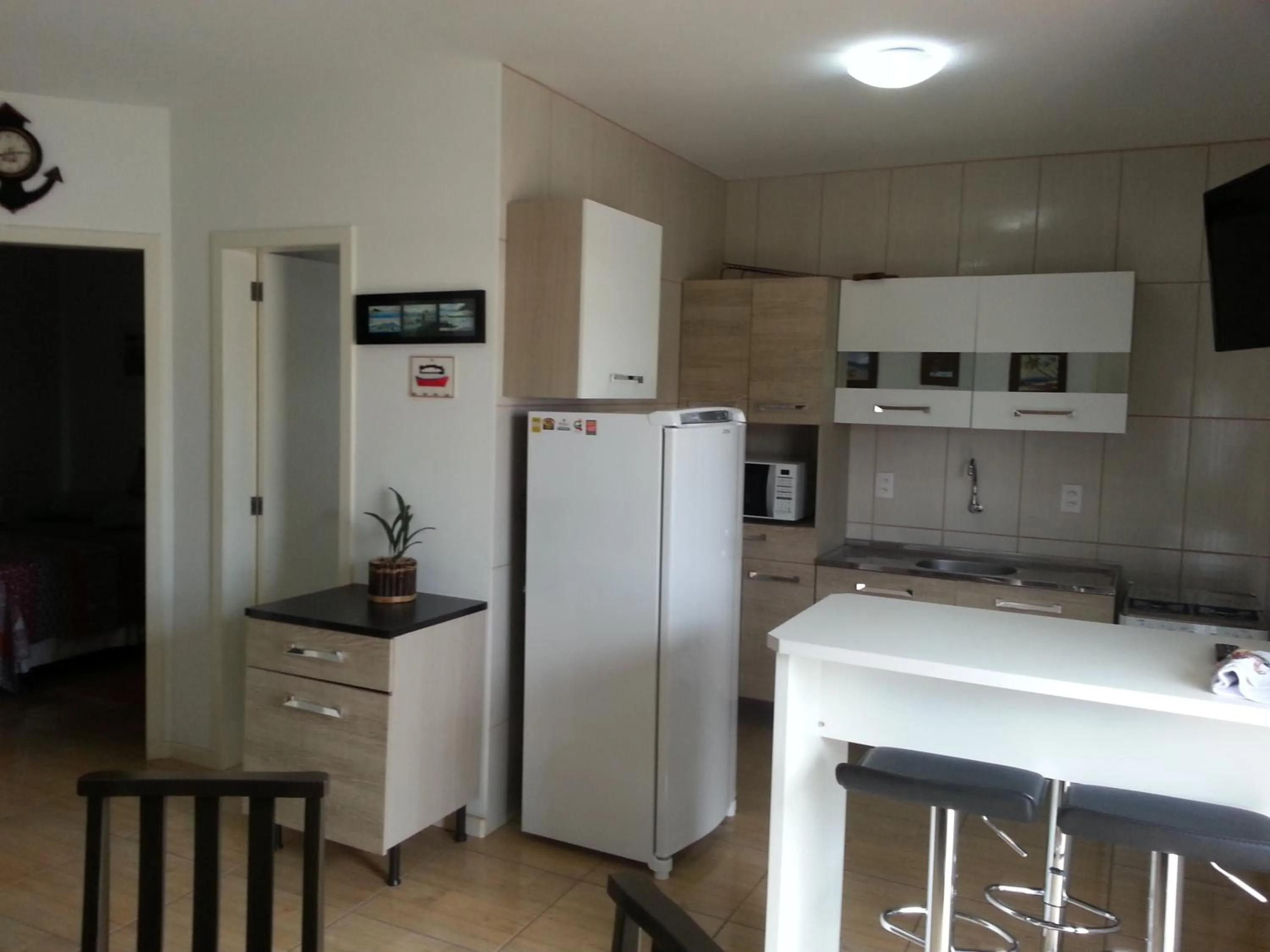 Communal kitchen in Palhoça Praia Ponta do Papagaio SUNSET Apto 102