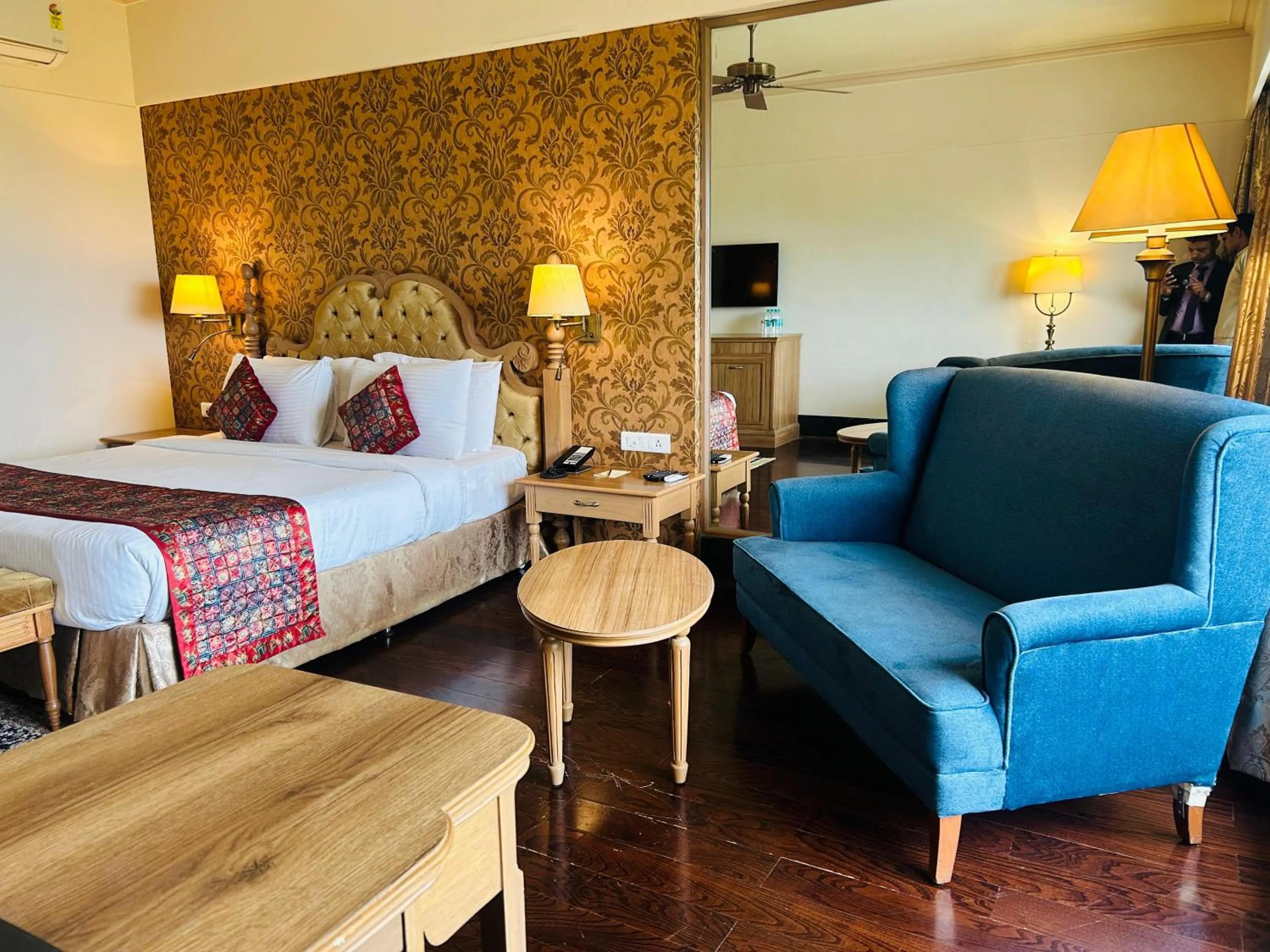 Seating area, Bed in Indana Palace Jaipur
