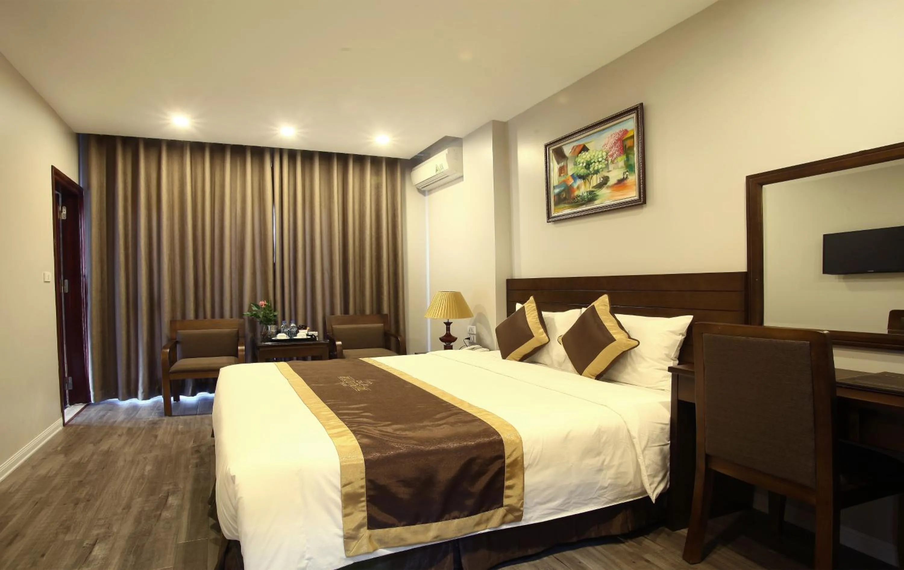 Bed in Blue Pearl West Hotel