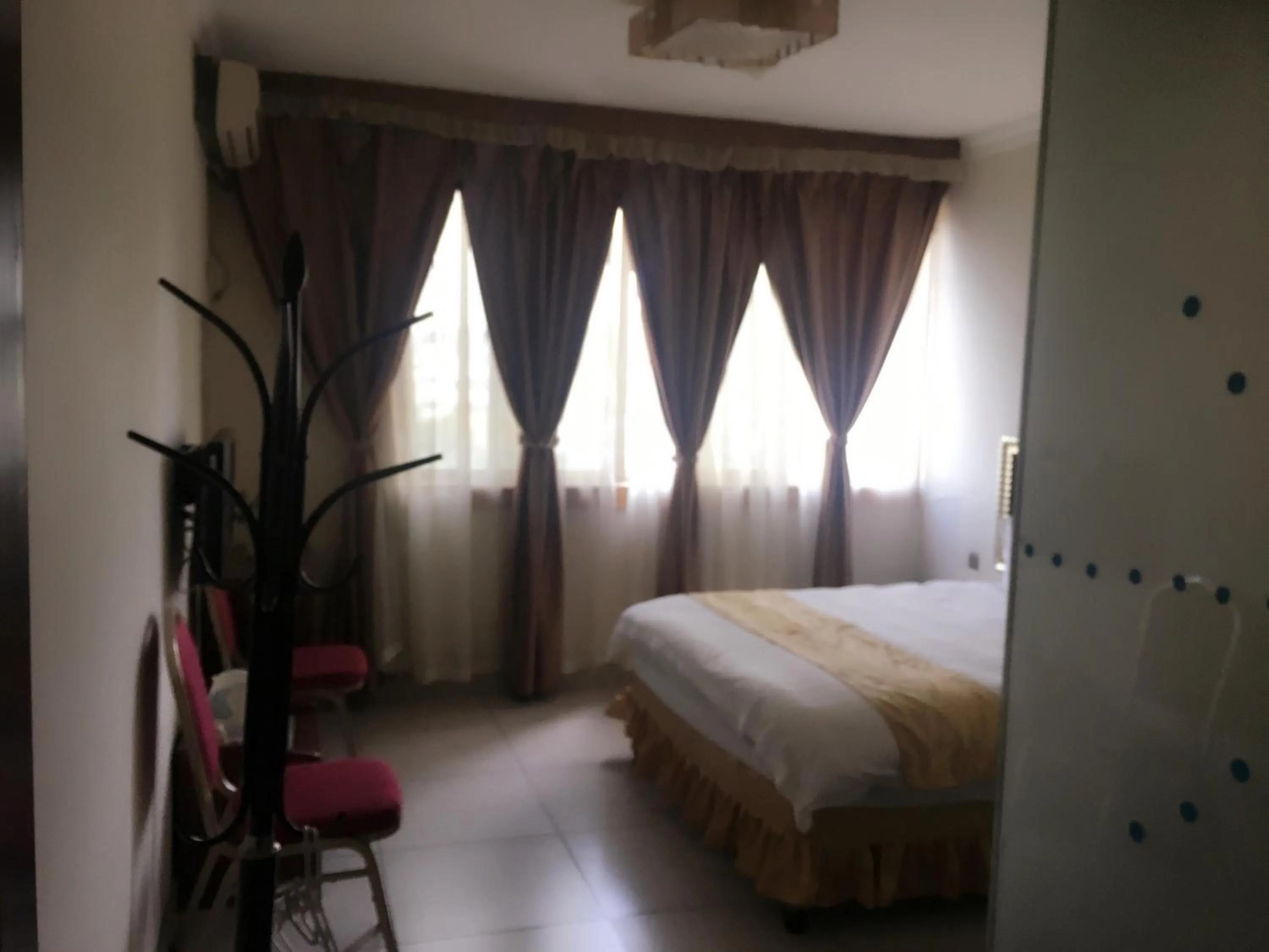 Bedroom in Shengtang Business Hotel