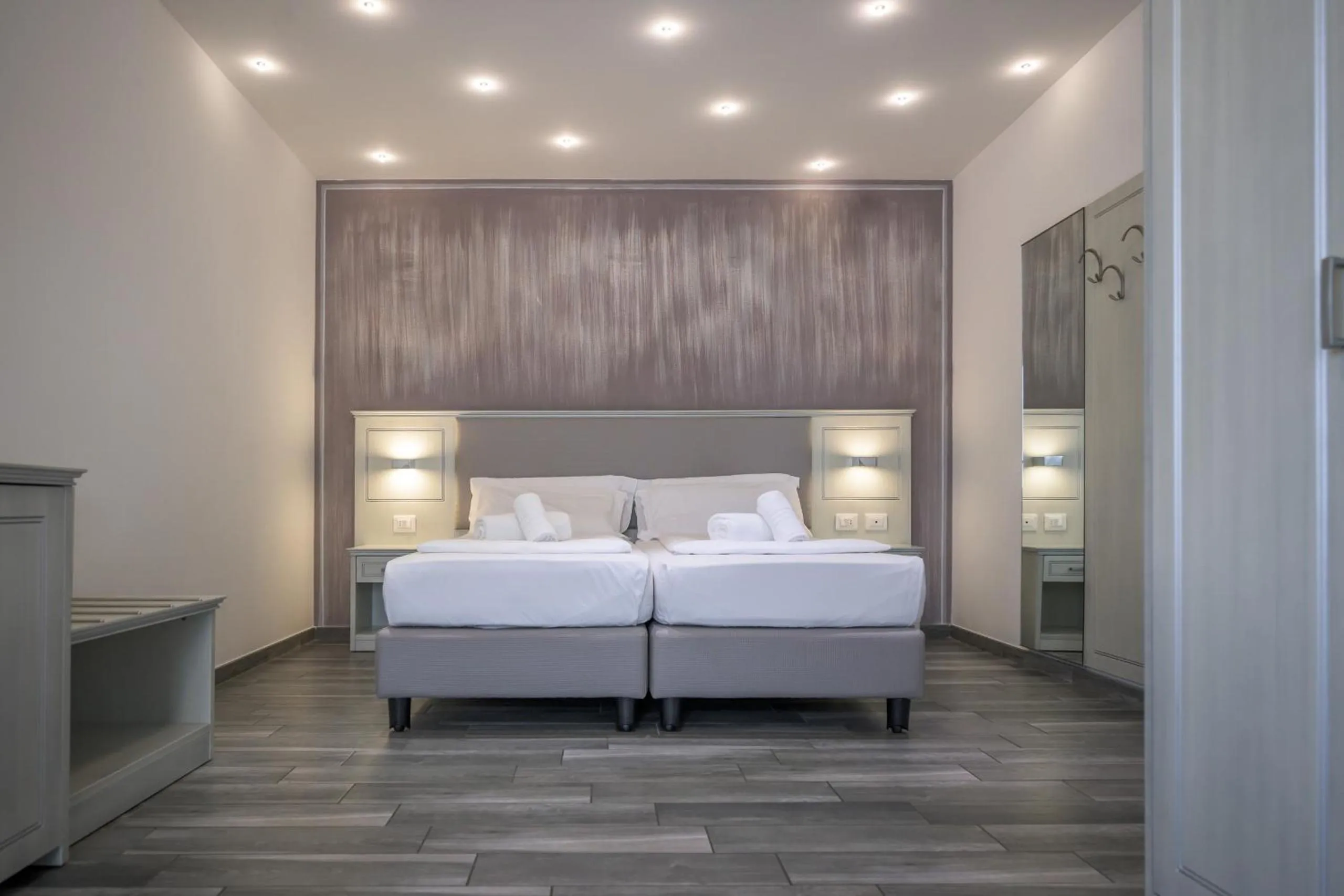 Bed in Hotel Villa Paradiso Suite