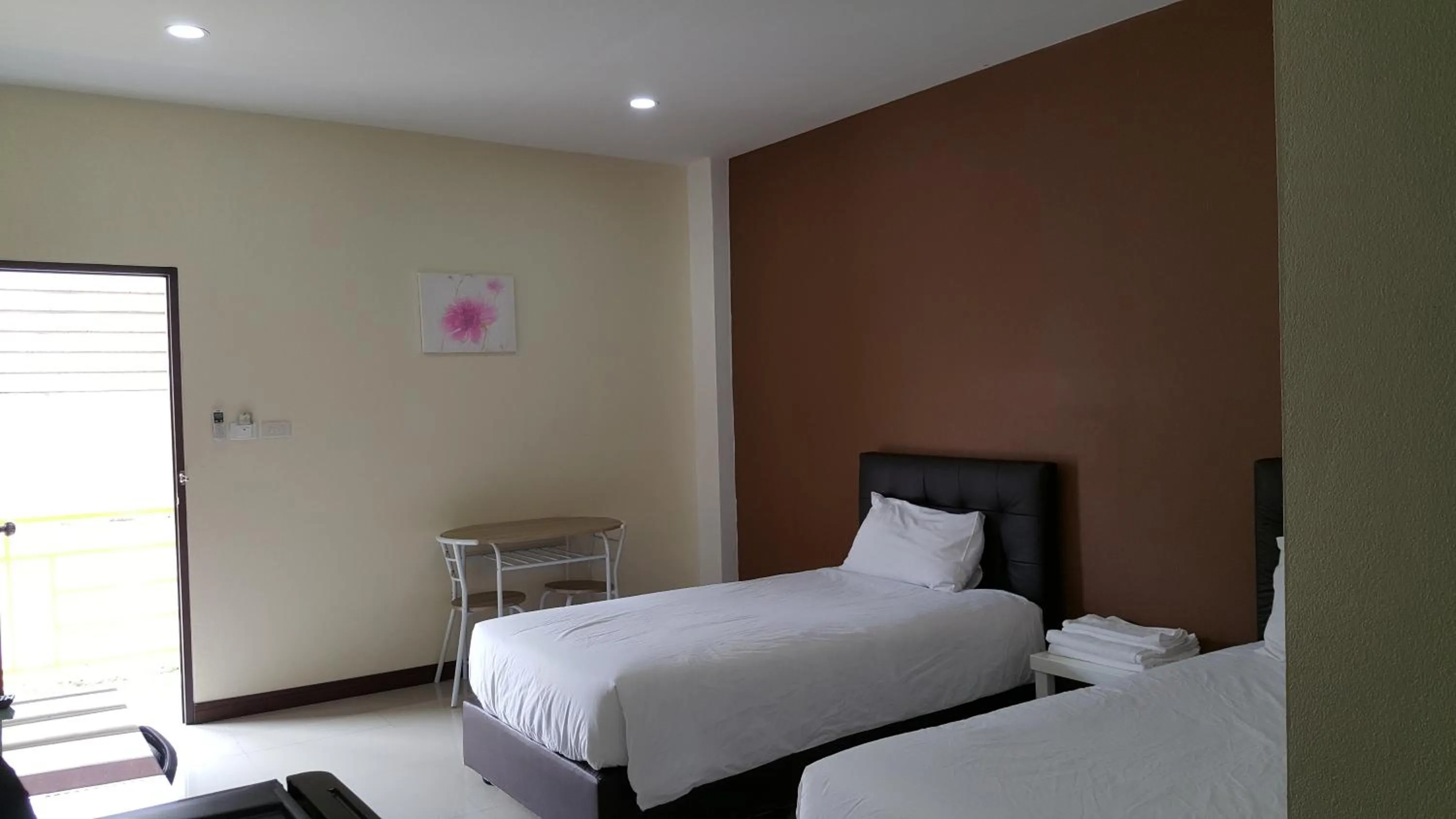 Bed in Charoensuk Grand Hotel