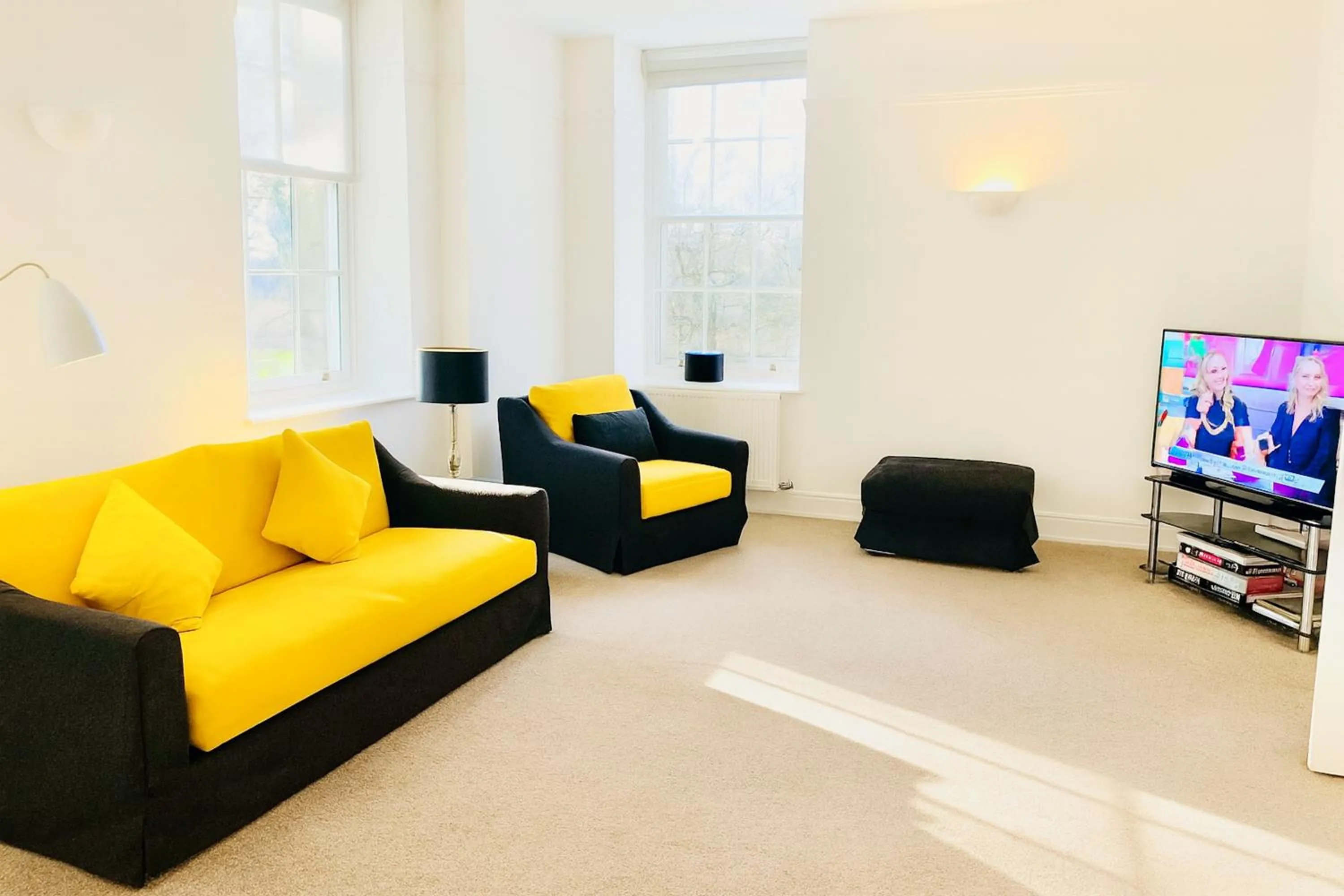 Communal lounge/ TV room in St Andrews Apartments