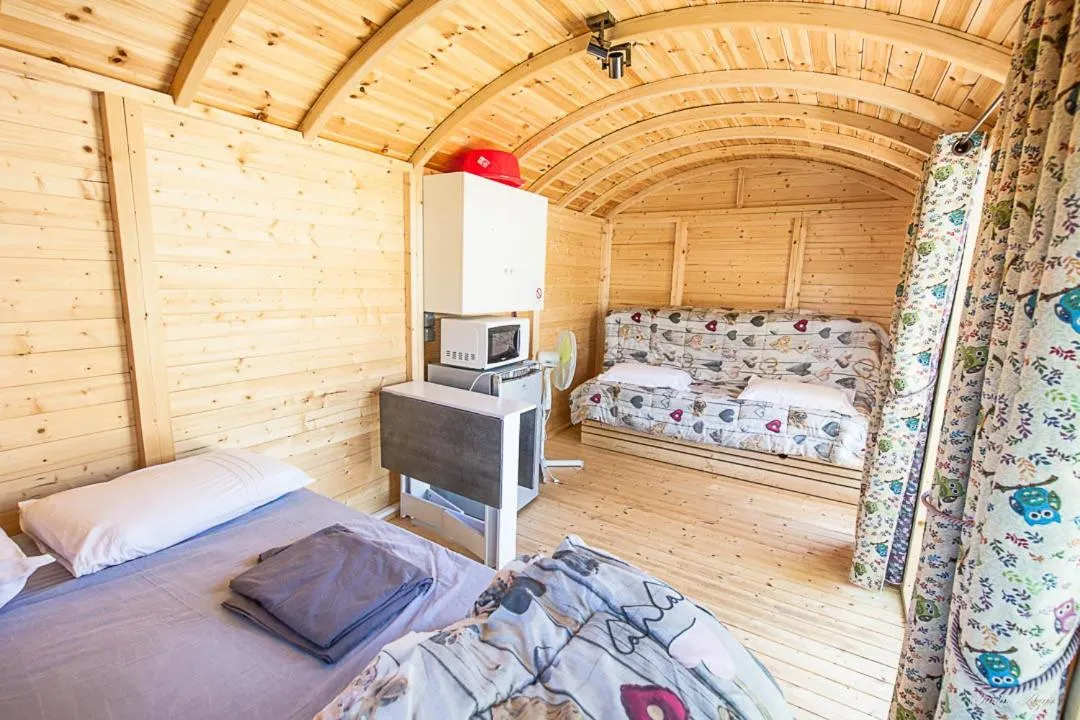 Bed in Camping de Tournus - Drole de cabane