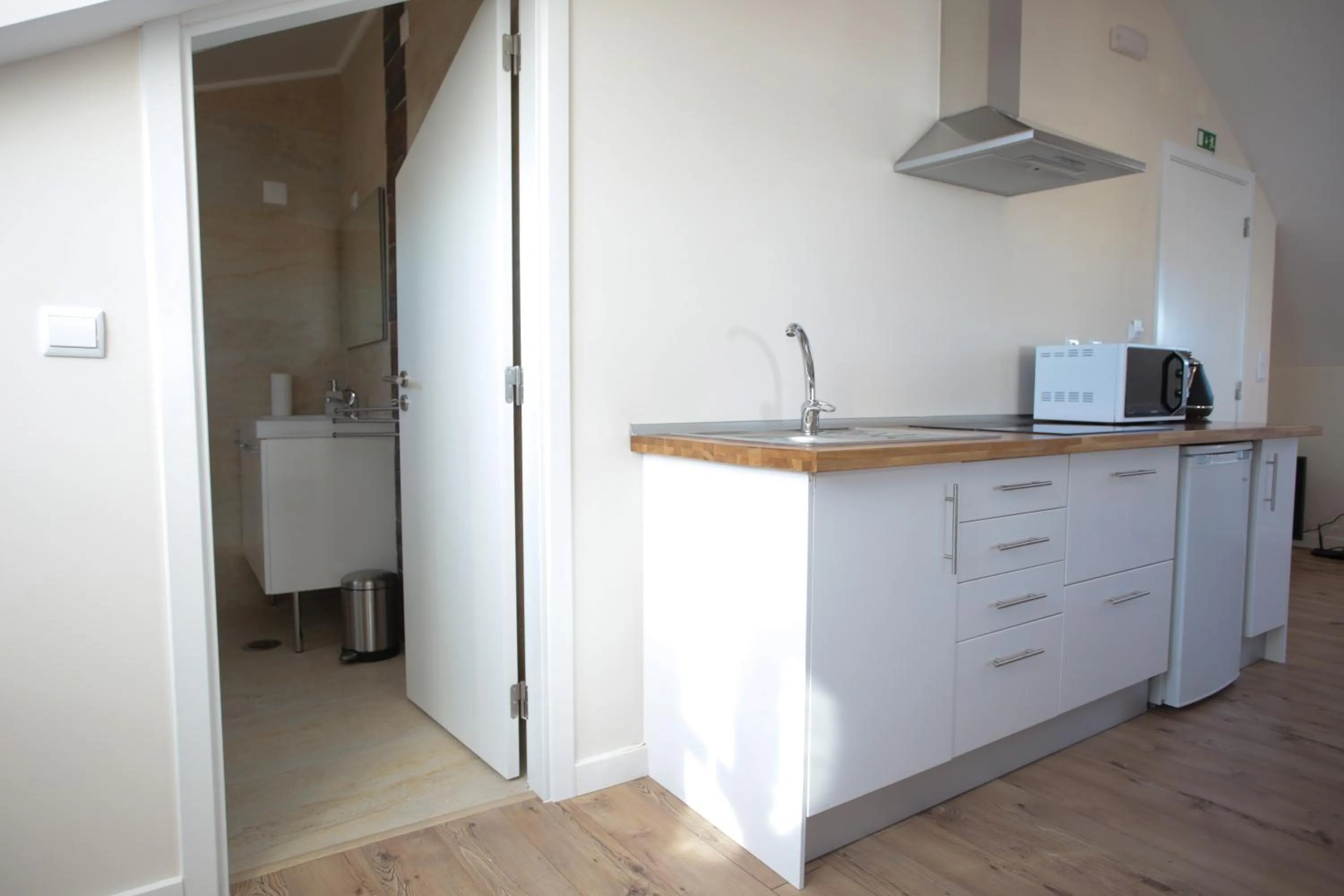 Kitchen or kitchenette in Suites Guest House