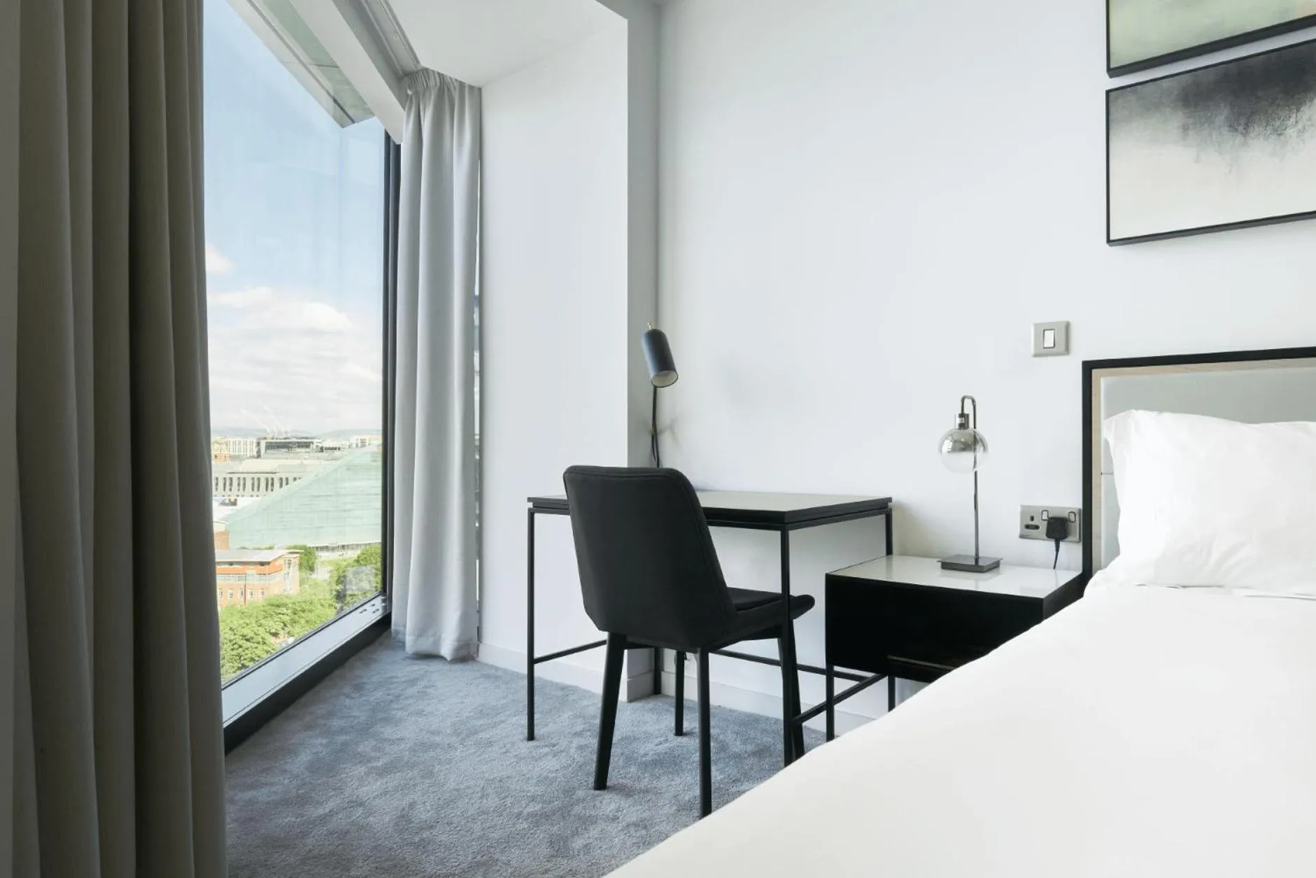 Seating area, Bed in CitySuites Aparthotel