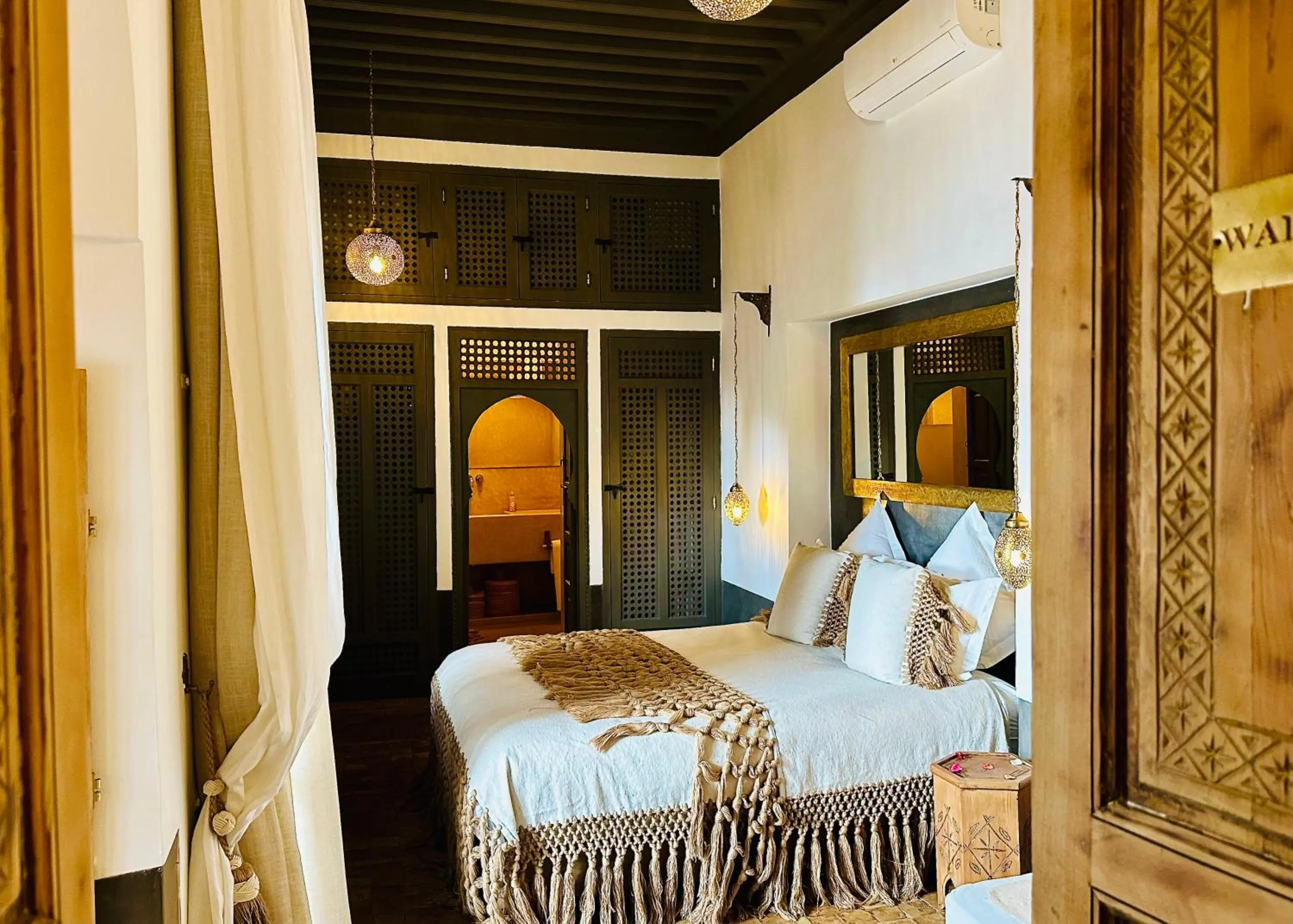 Bed in Riad Jardin Des Sens & Spa
