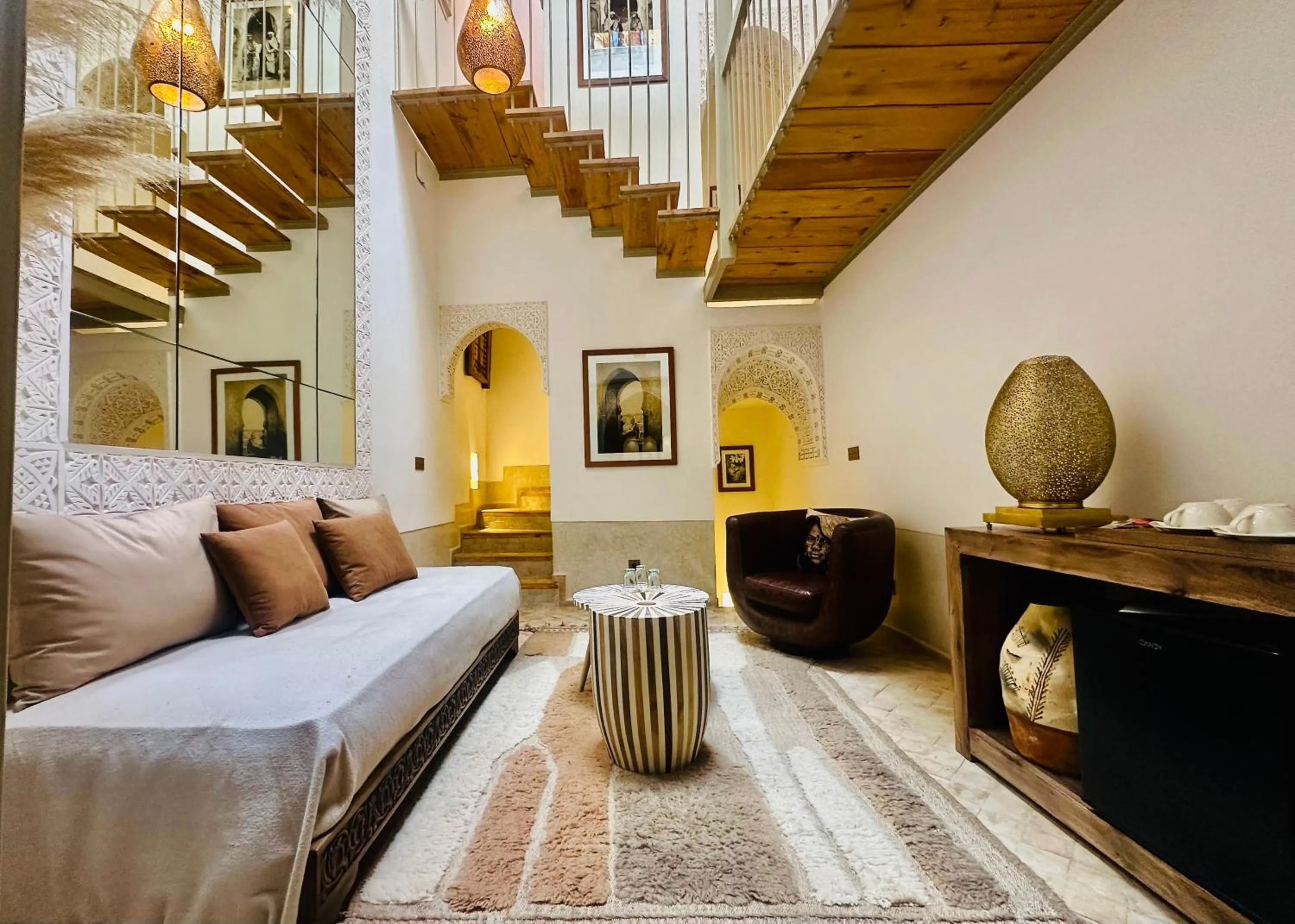 Living room, Bed in Riad Jardin Des Sens & Spa