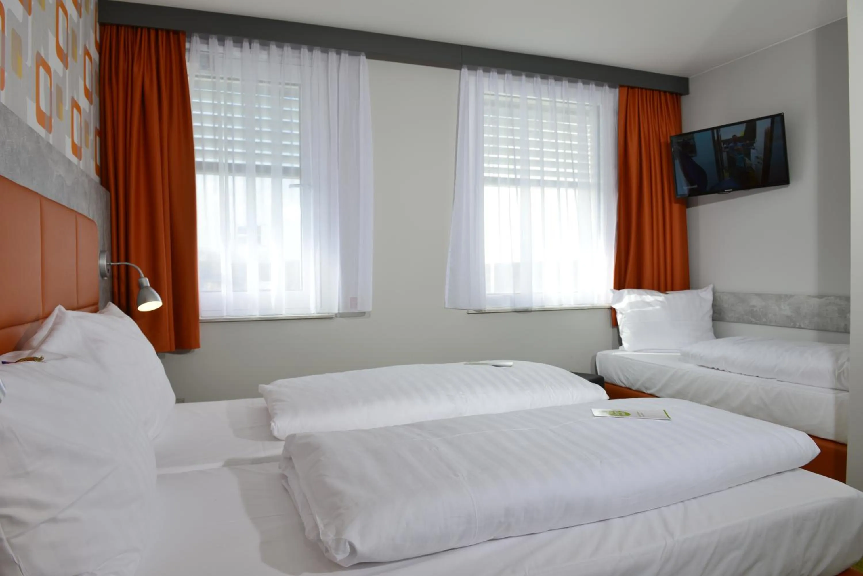 TV and multimedia, Bed in SleepySleepy Hotel Gießen