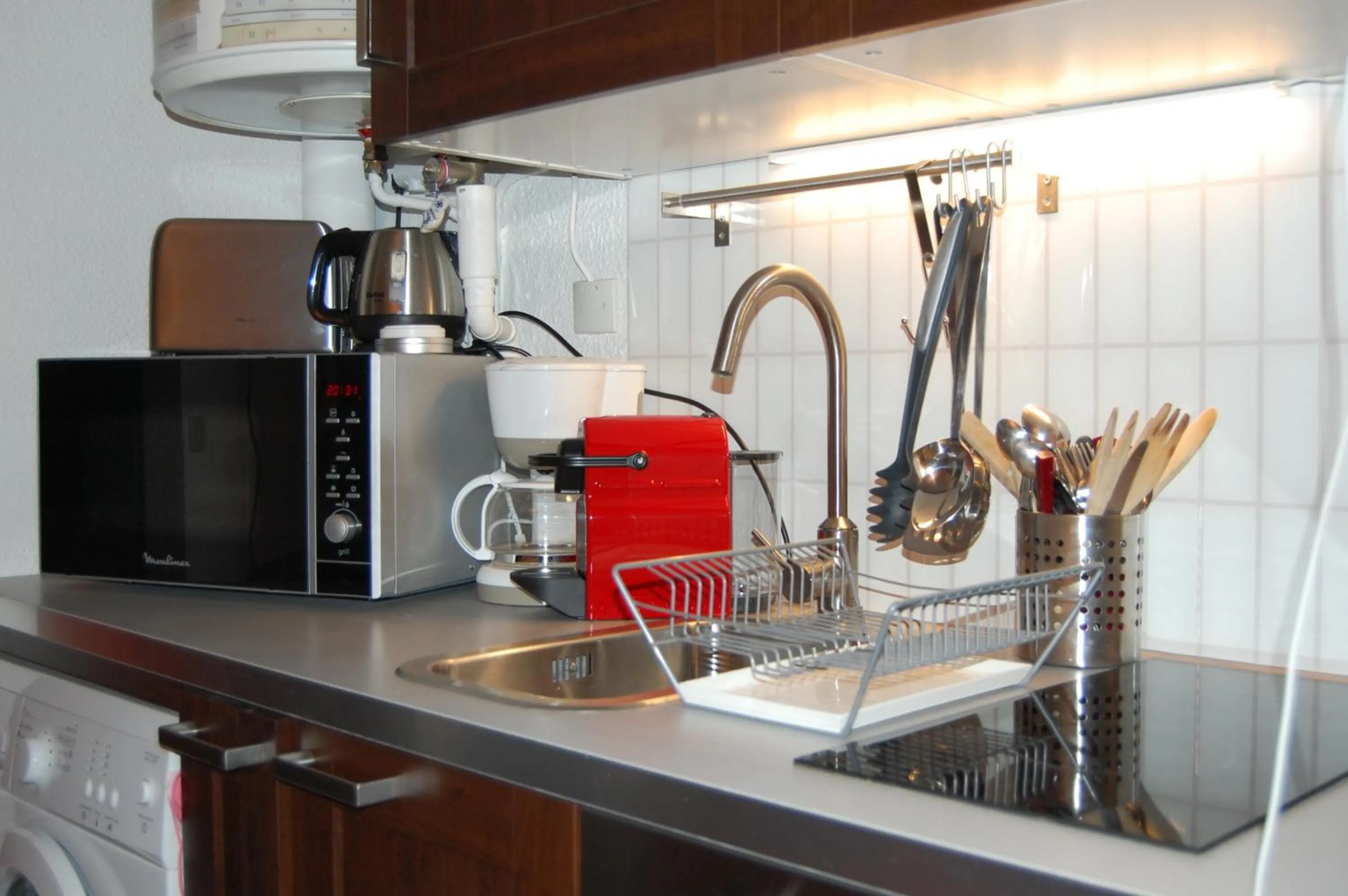 Kitchen or kitchenette in Au Coeur du Village Naturiste