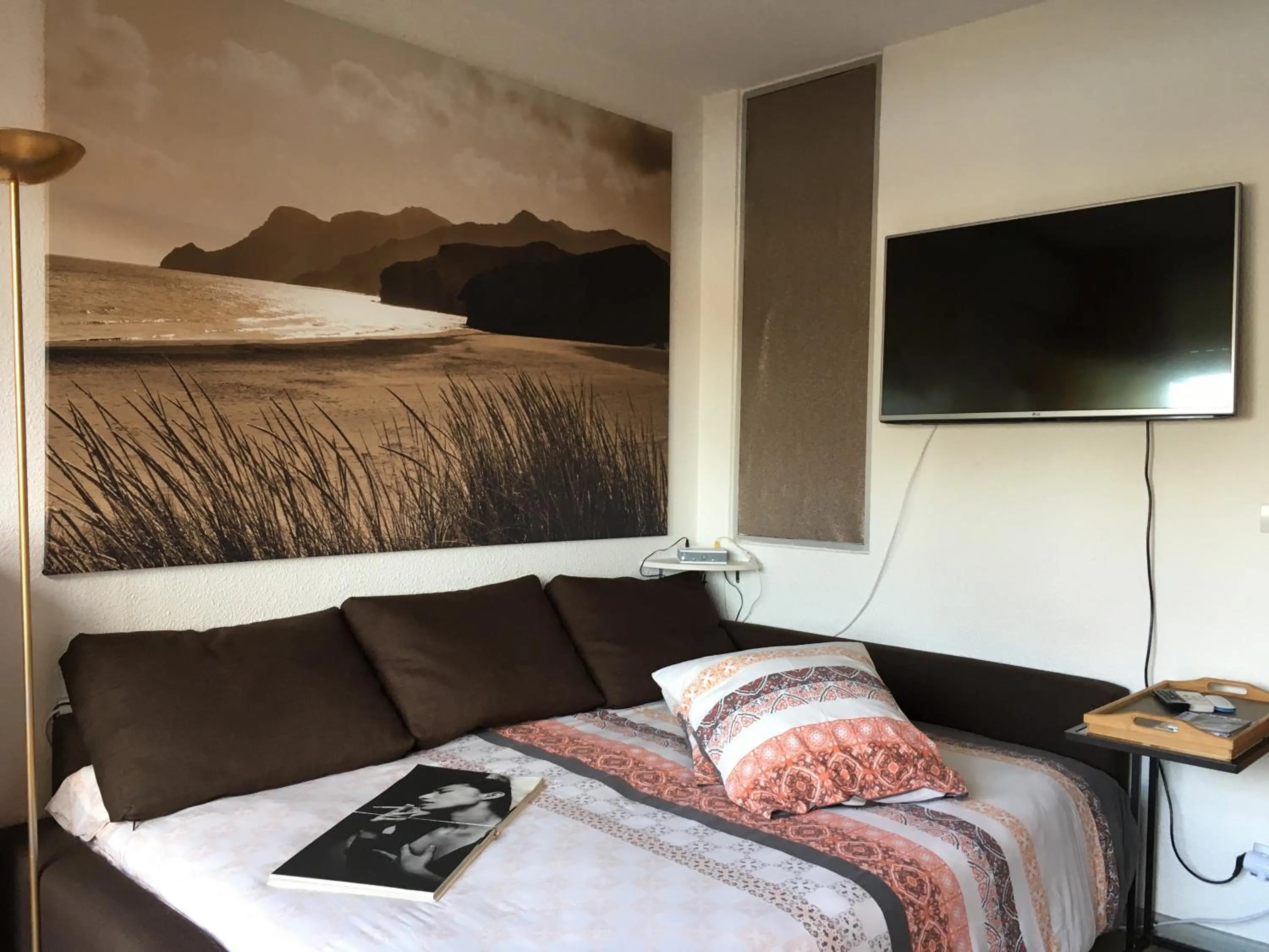 Bed in Au Coeur du Village Naturiste