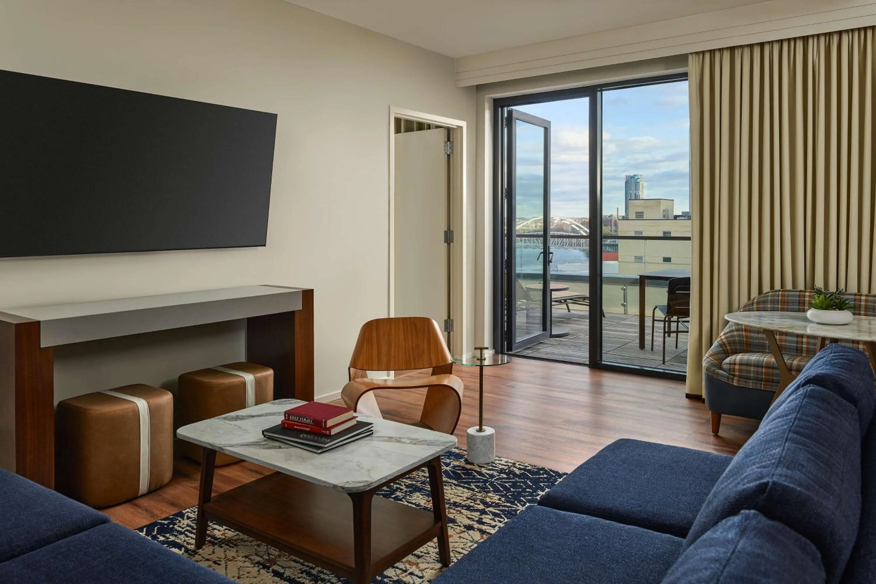 Living room in The Bankers Alley Hotel Nashville, Tapestry Collection by Hilton
