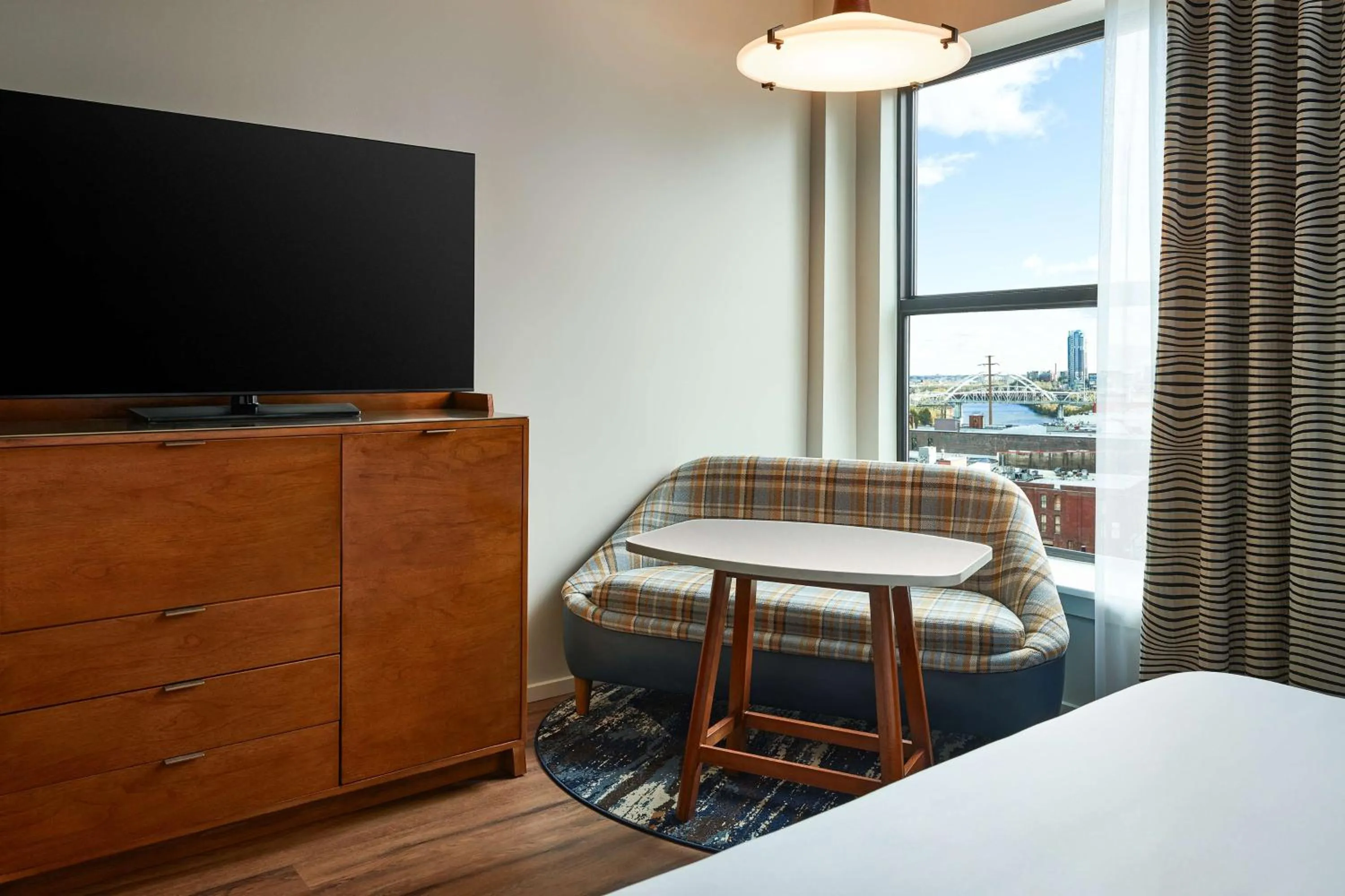 Living room, Bed in The Bankers Alley Hotel Nashville, Tapestry Collection by Hilton