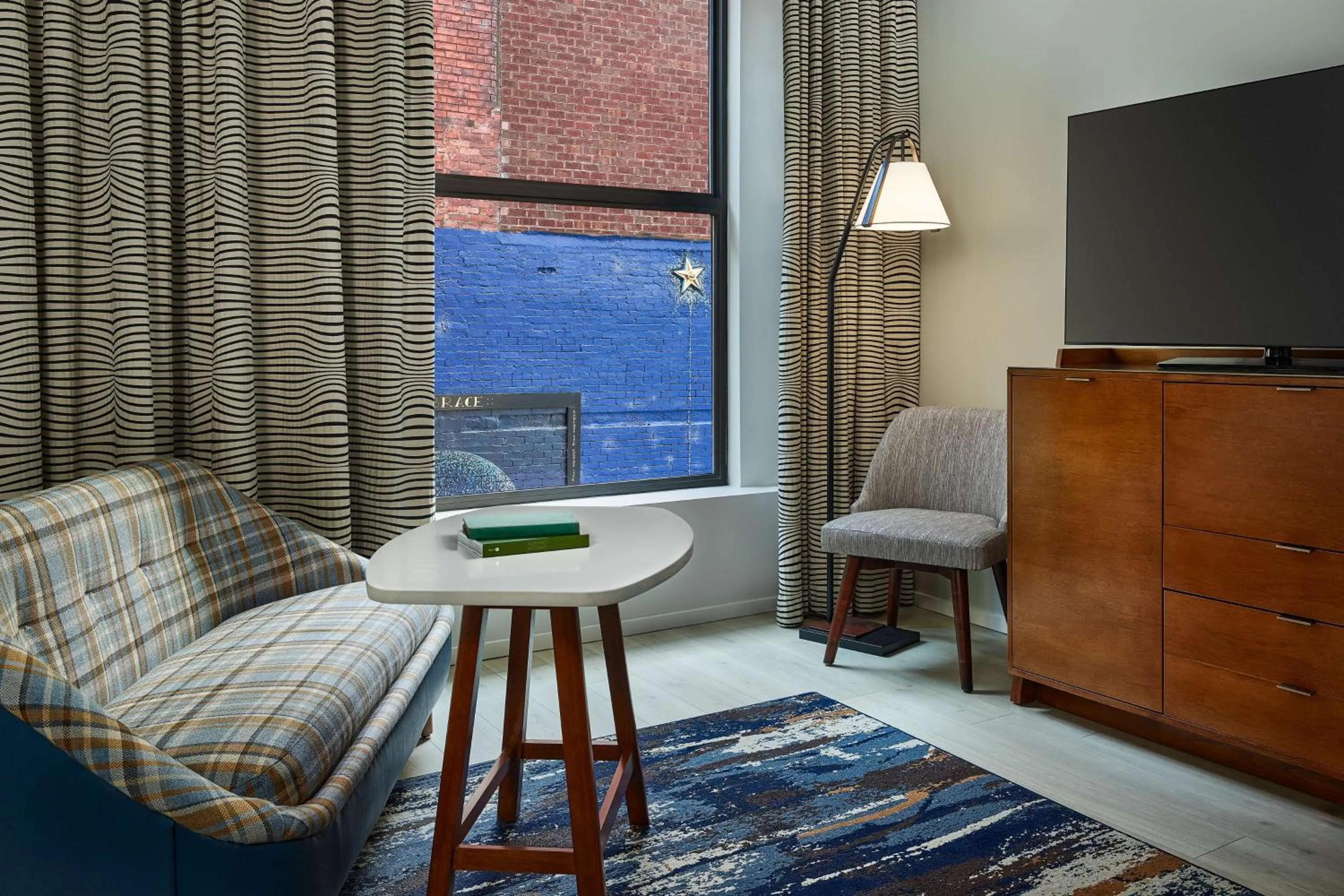 Living room in The Bankers Alley Hotel Nashville, Tapestry Collection by Hilton