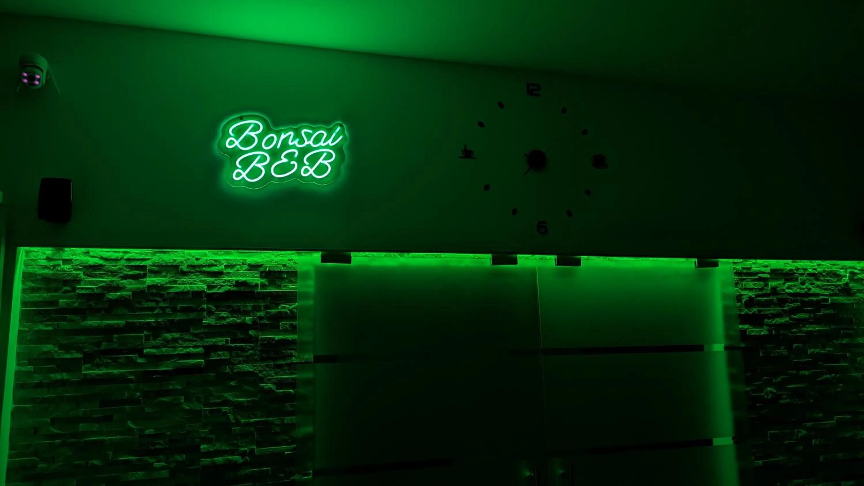 Property logo or sign in Bonsai Bed & Breakfast