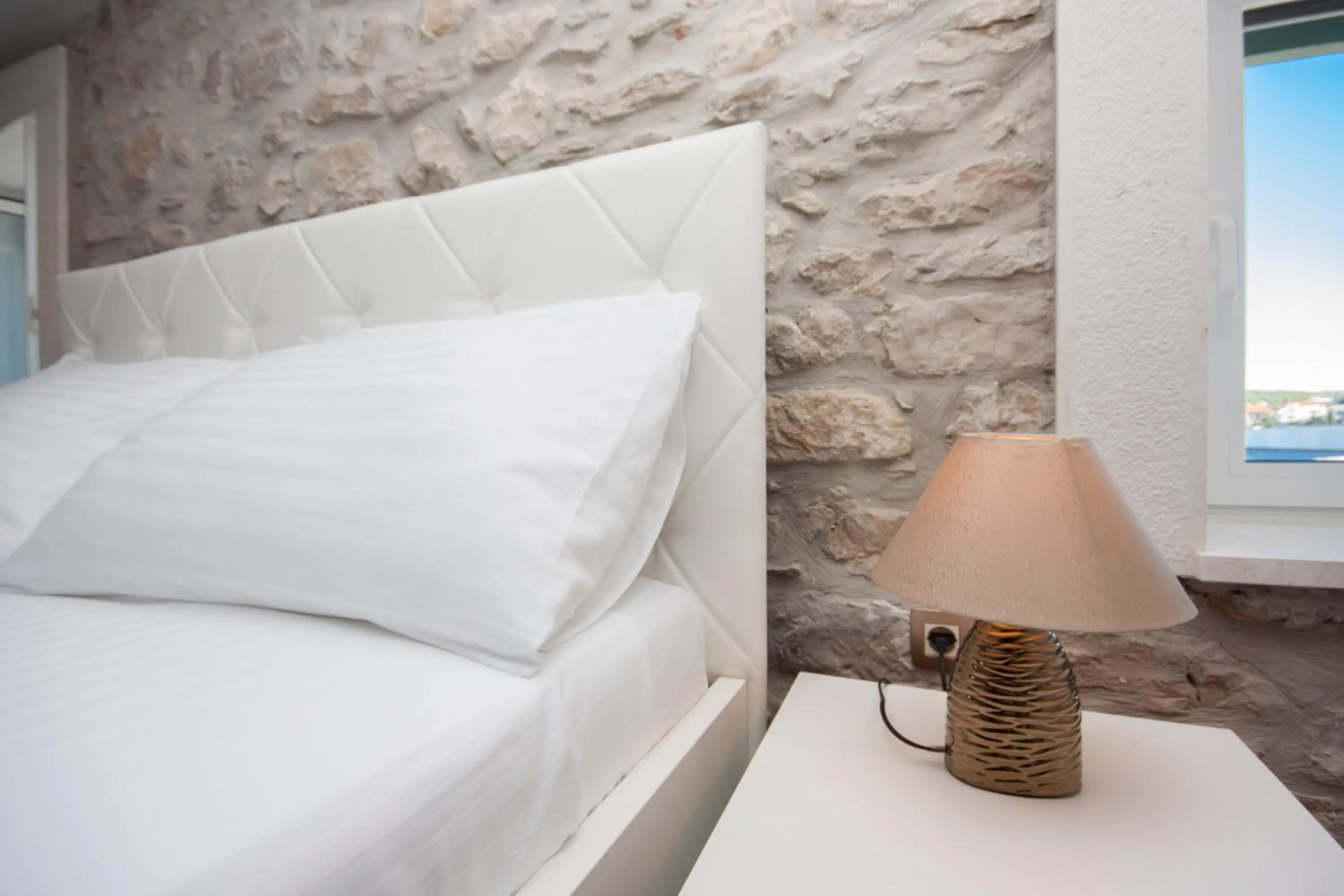 Bed in Apartments Dalmata