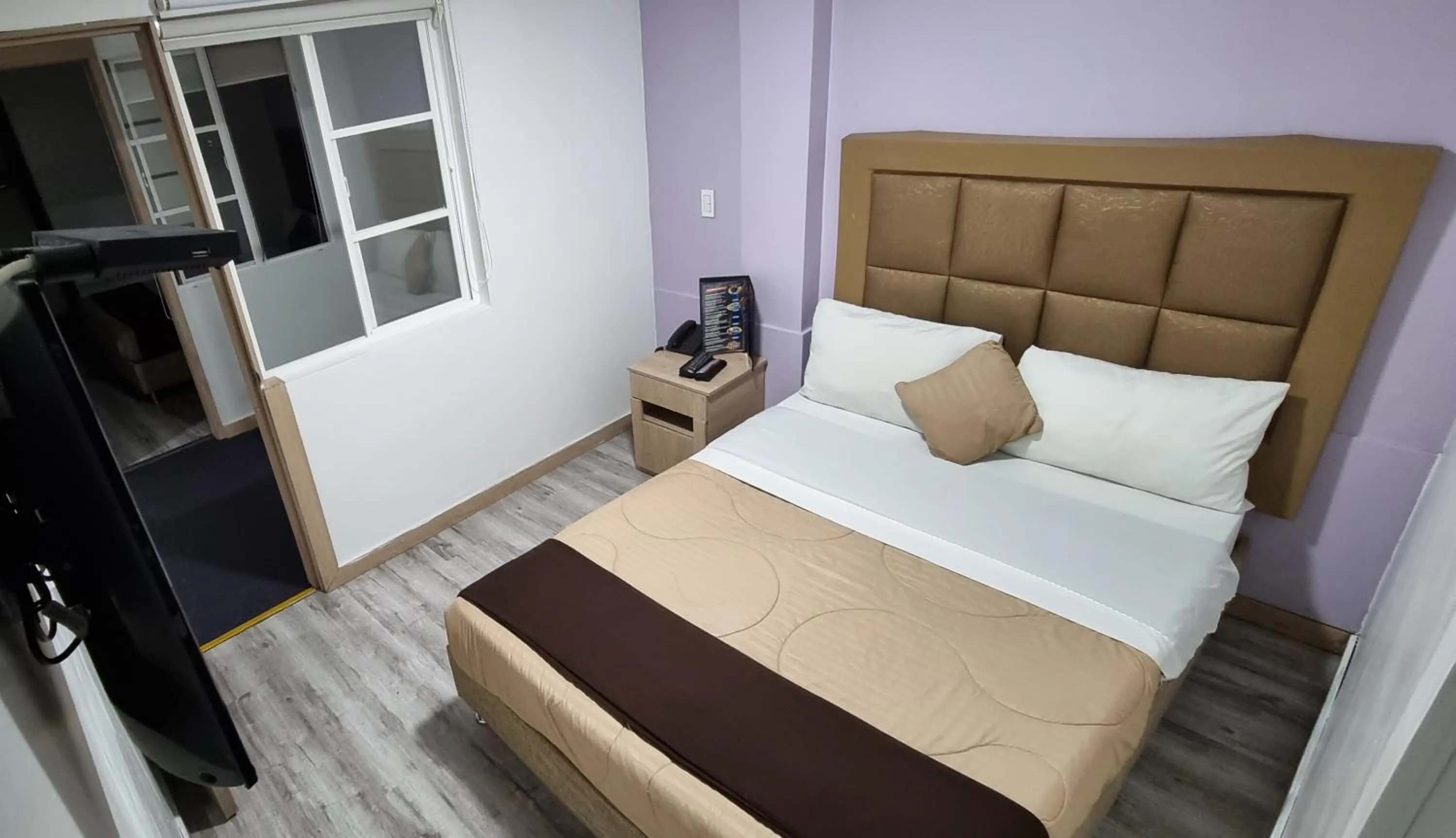 Photo of the whole room, Bed in Blue House Corferias