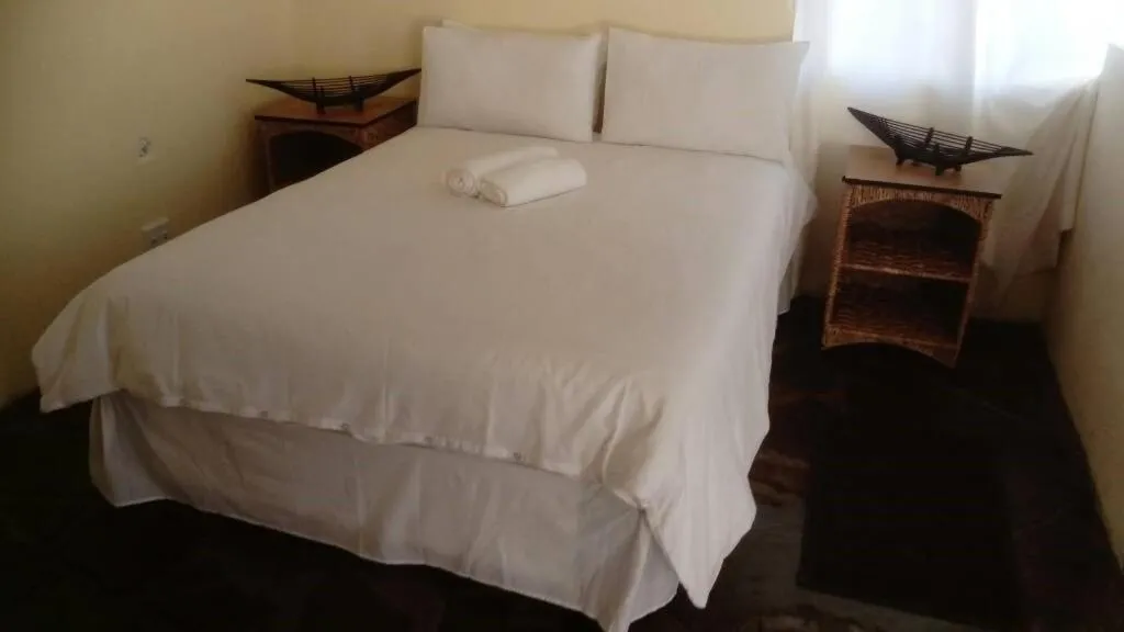 Bed in Murangi Travel Lodge