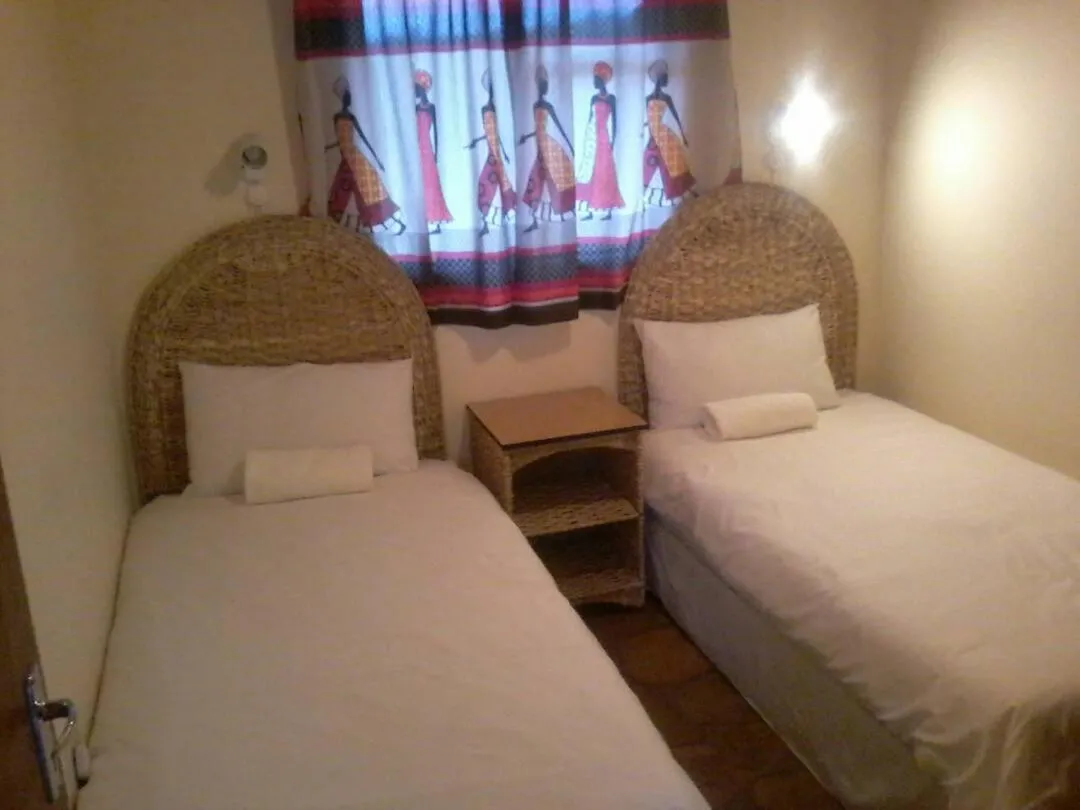 Bed in Murangi Travel Lodge