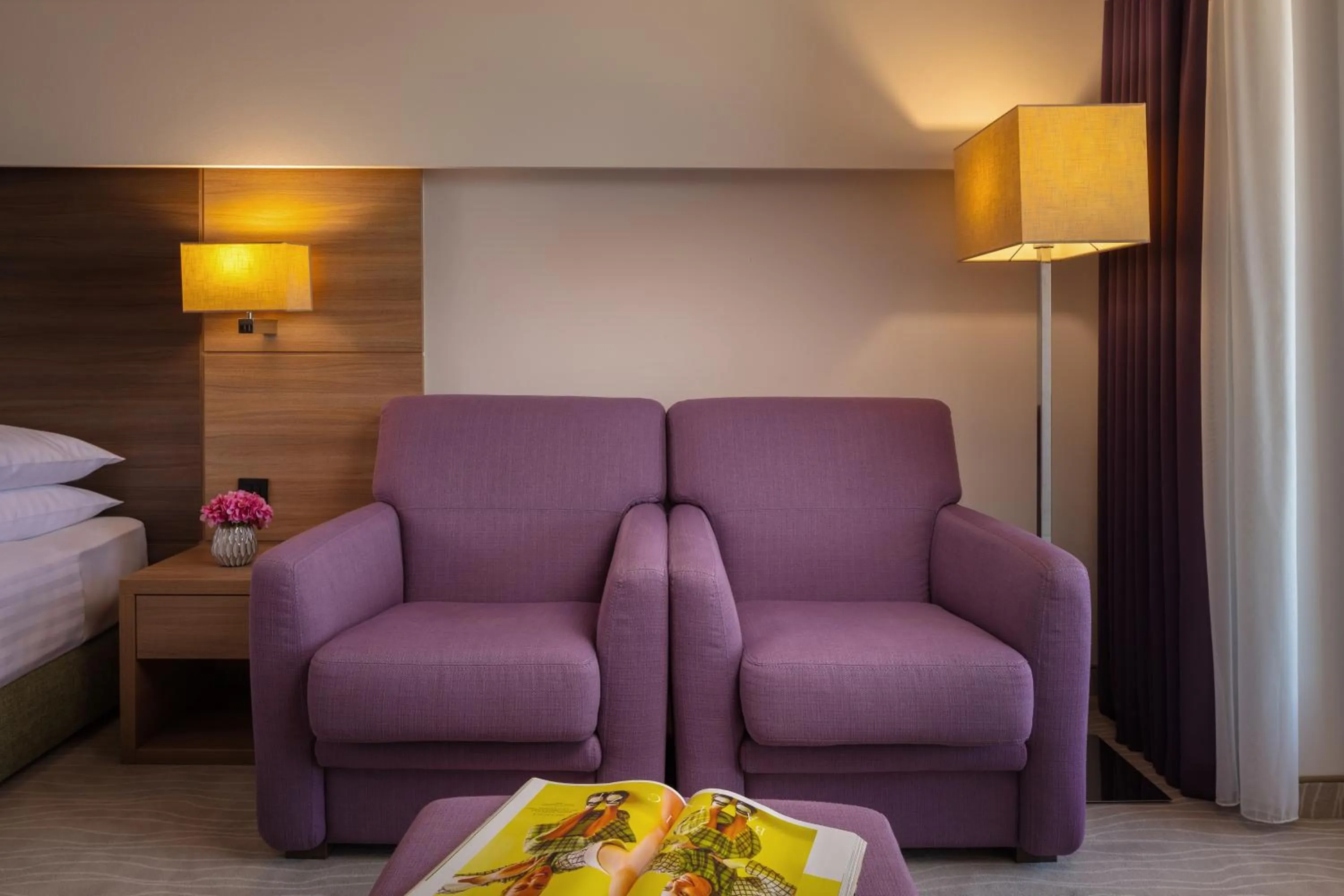 Seating area, Bed in Vitality Hotel Punta