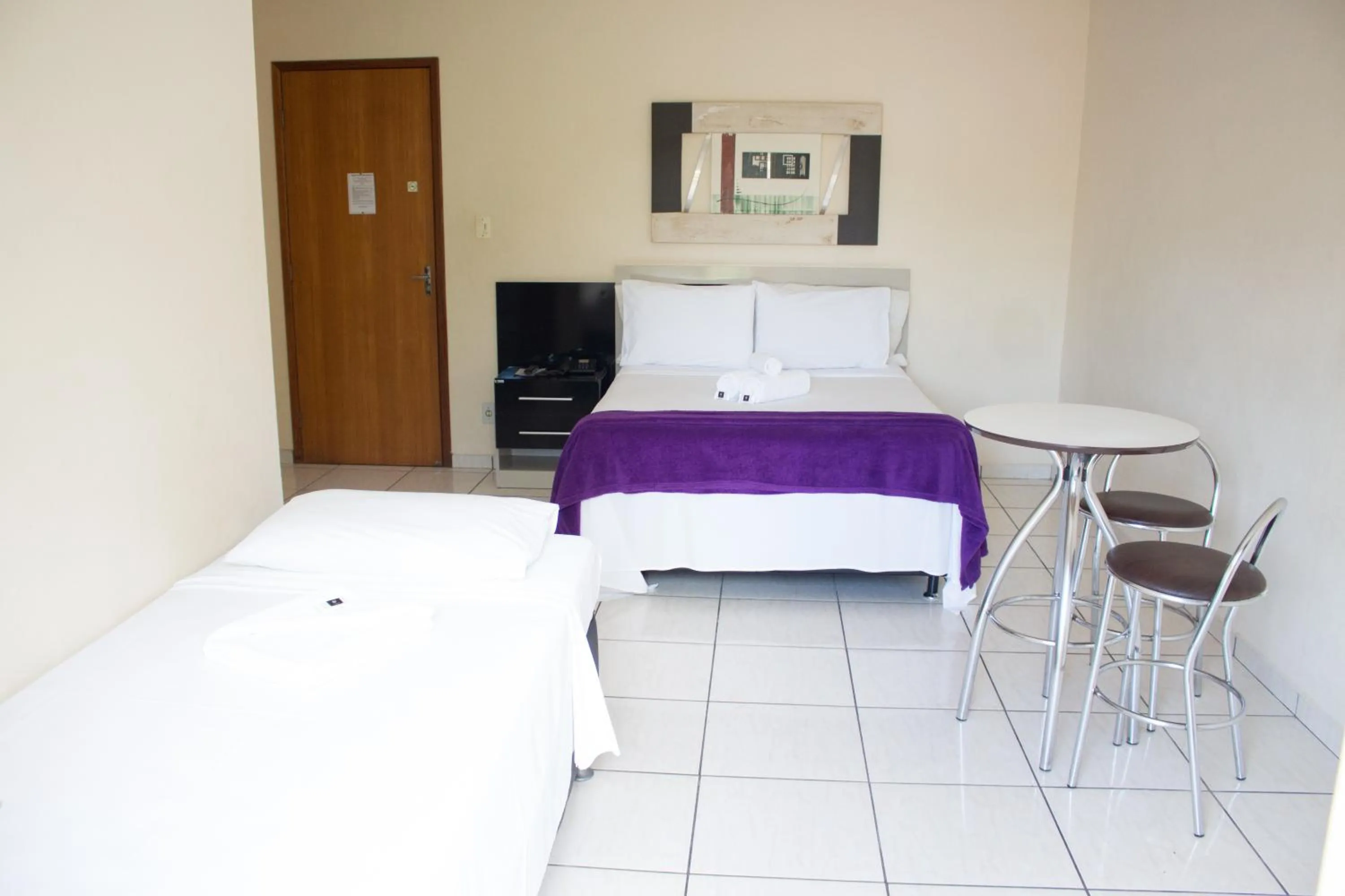 Bed in Gabvini Hotel