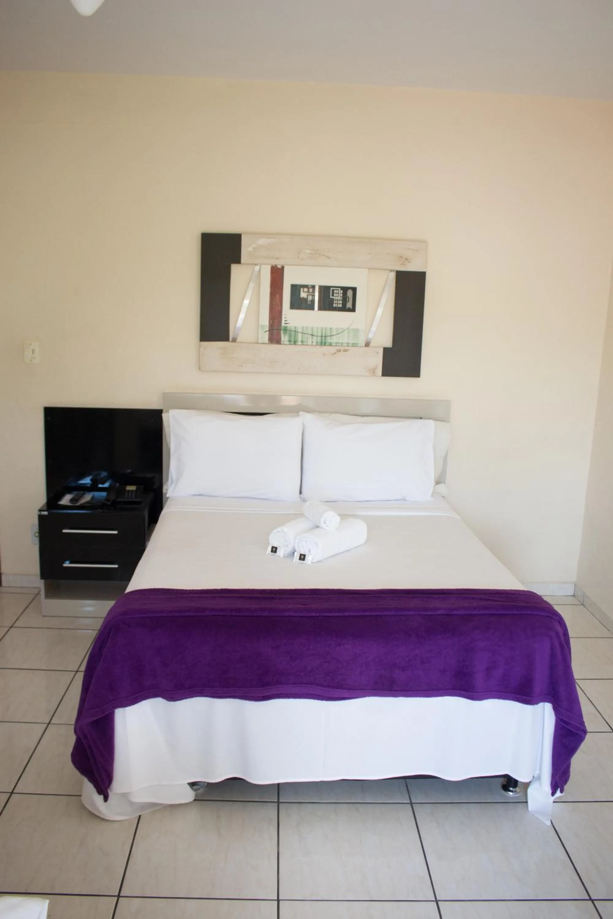 Bed in Gabvini Hotel