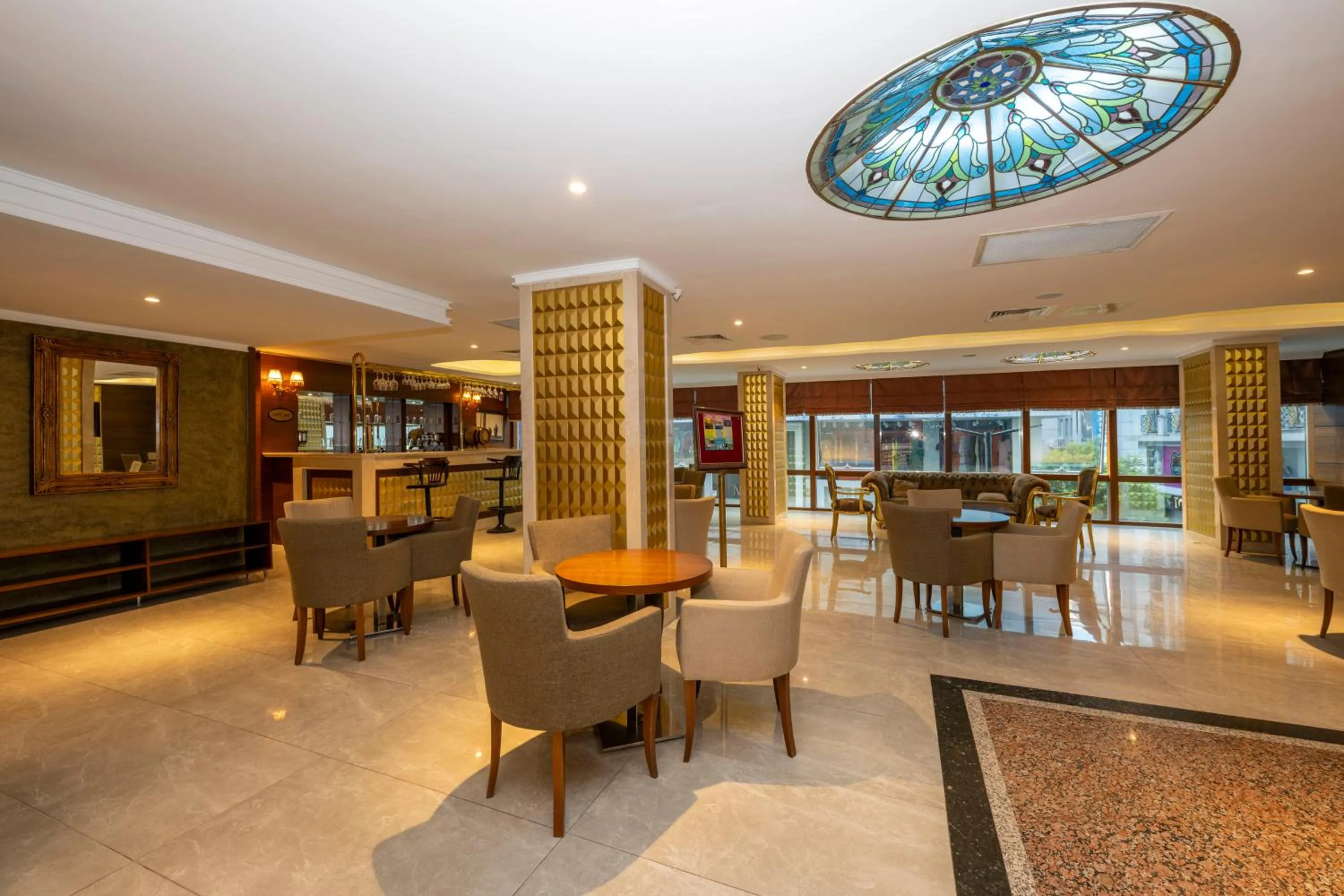 Communal lounge/ TV room in Dalan Otel