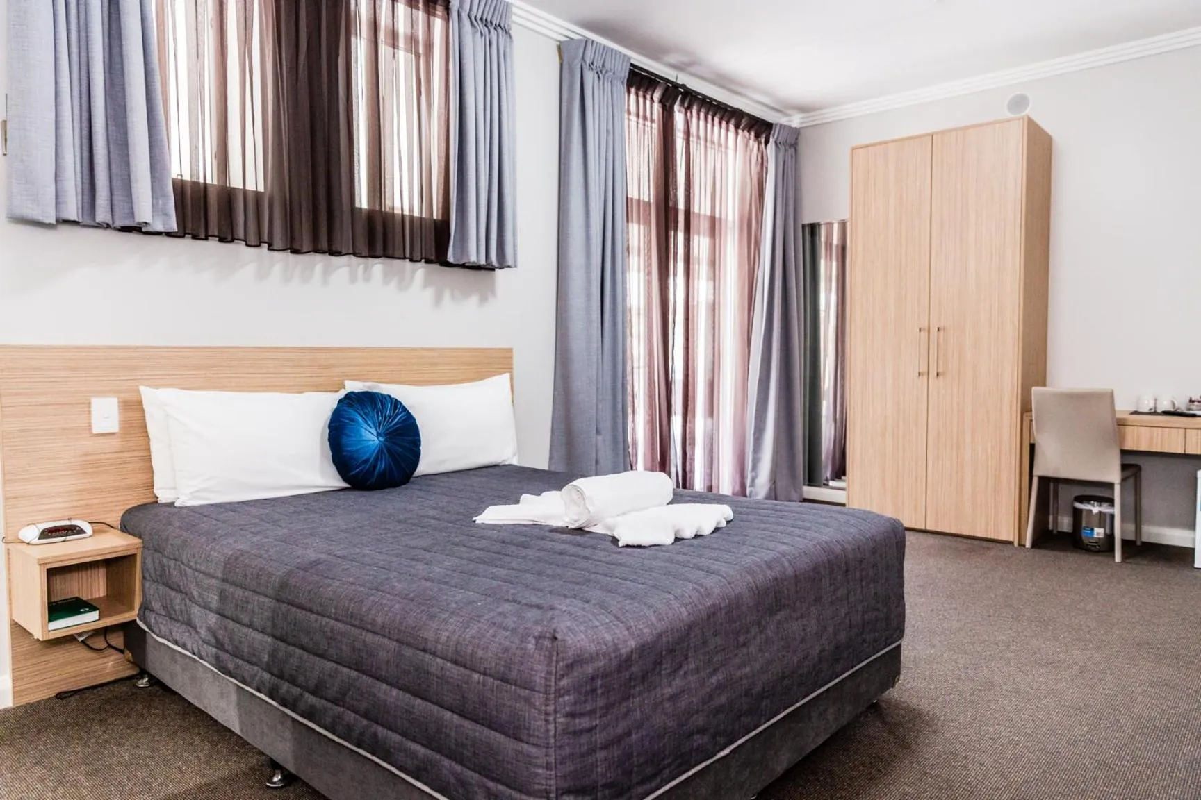 Bed in Lakes and Ocean Hotel Forster