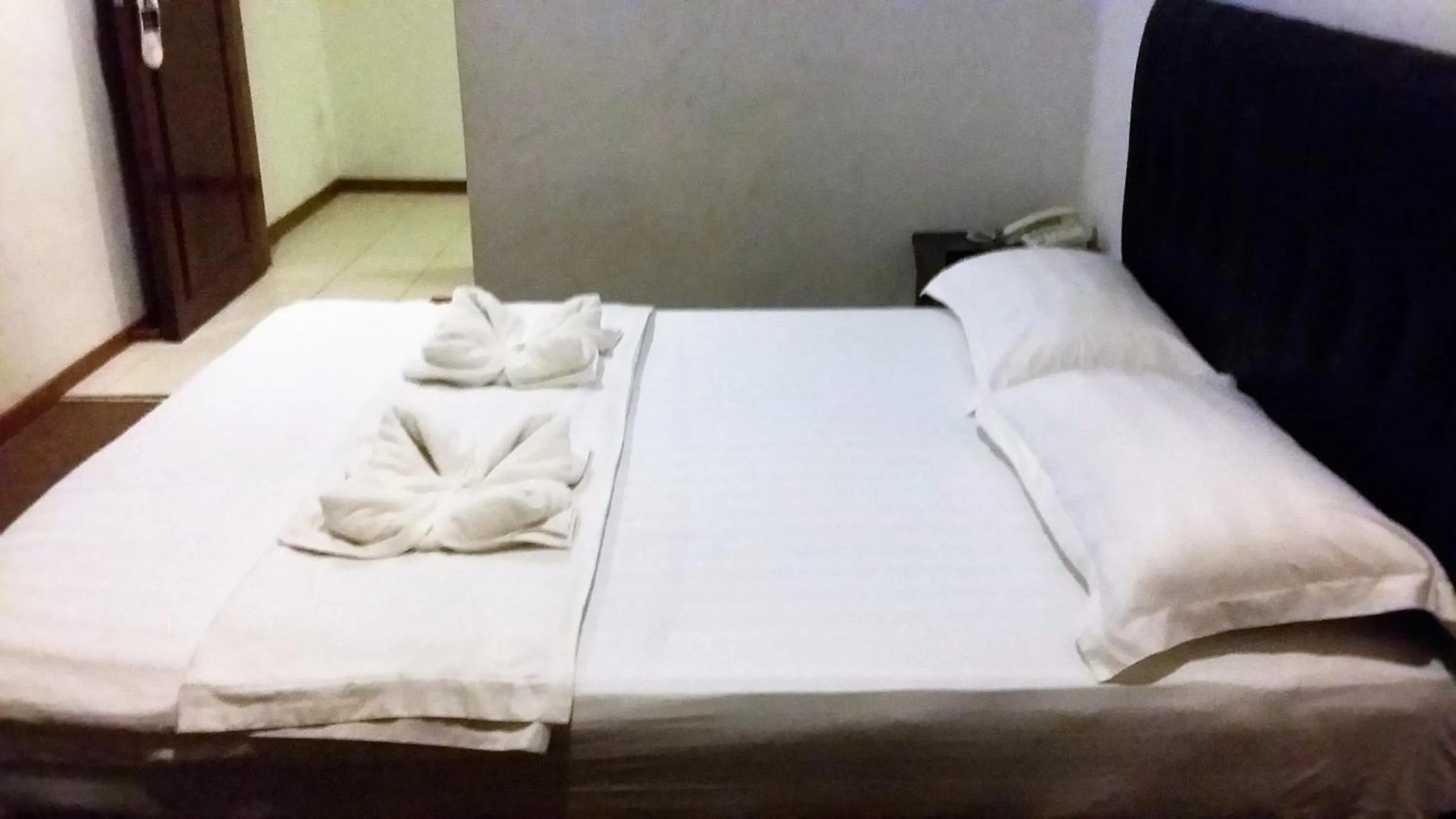 Bed in Alonto Hotel