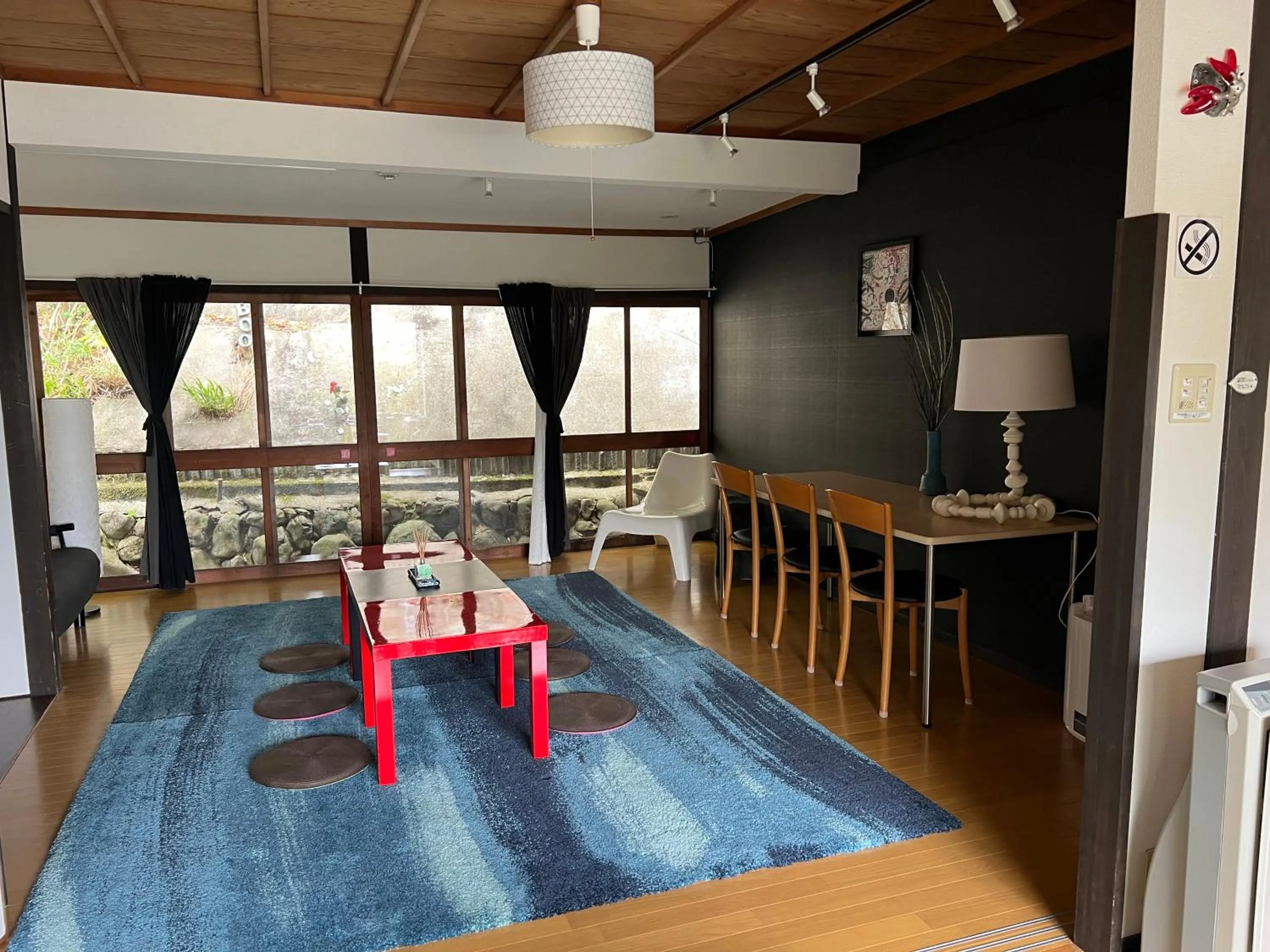 Living room, Bed in Bamboo Village Guest House