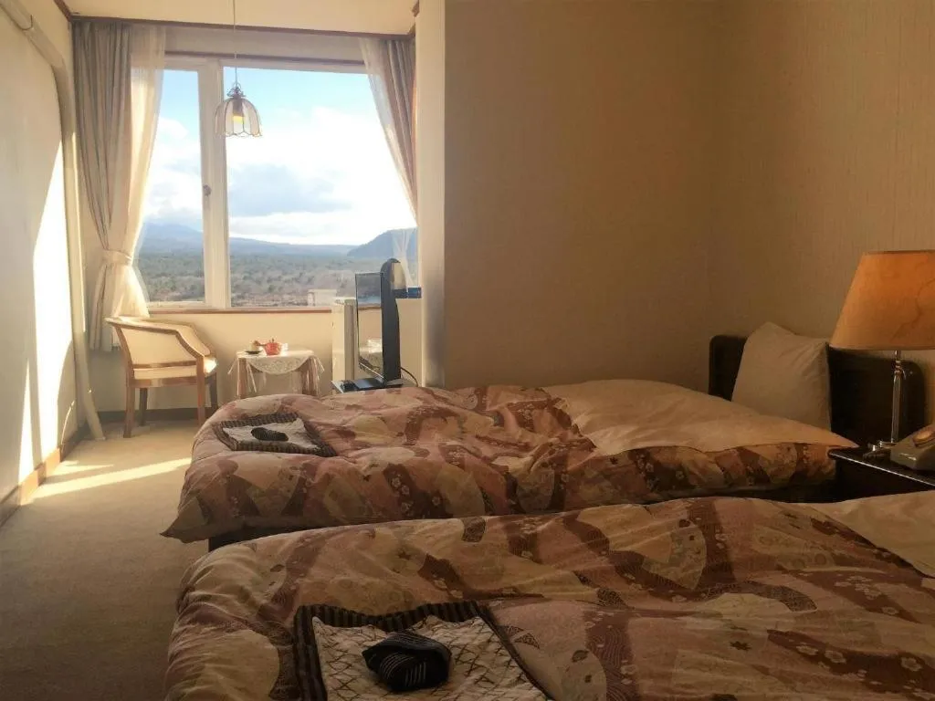 Bed in Shoji Lake Hotel