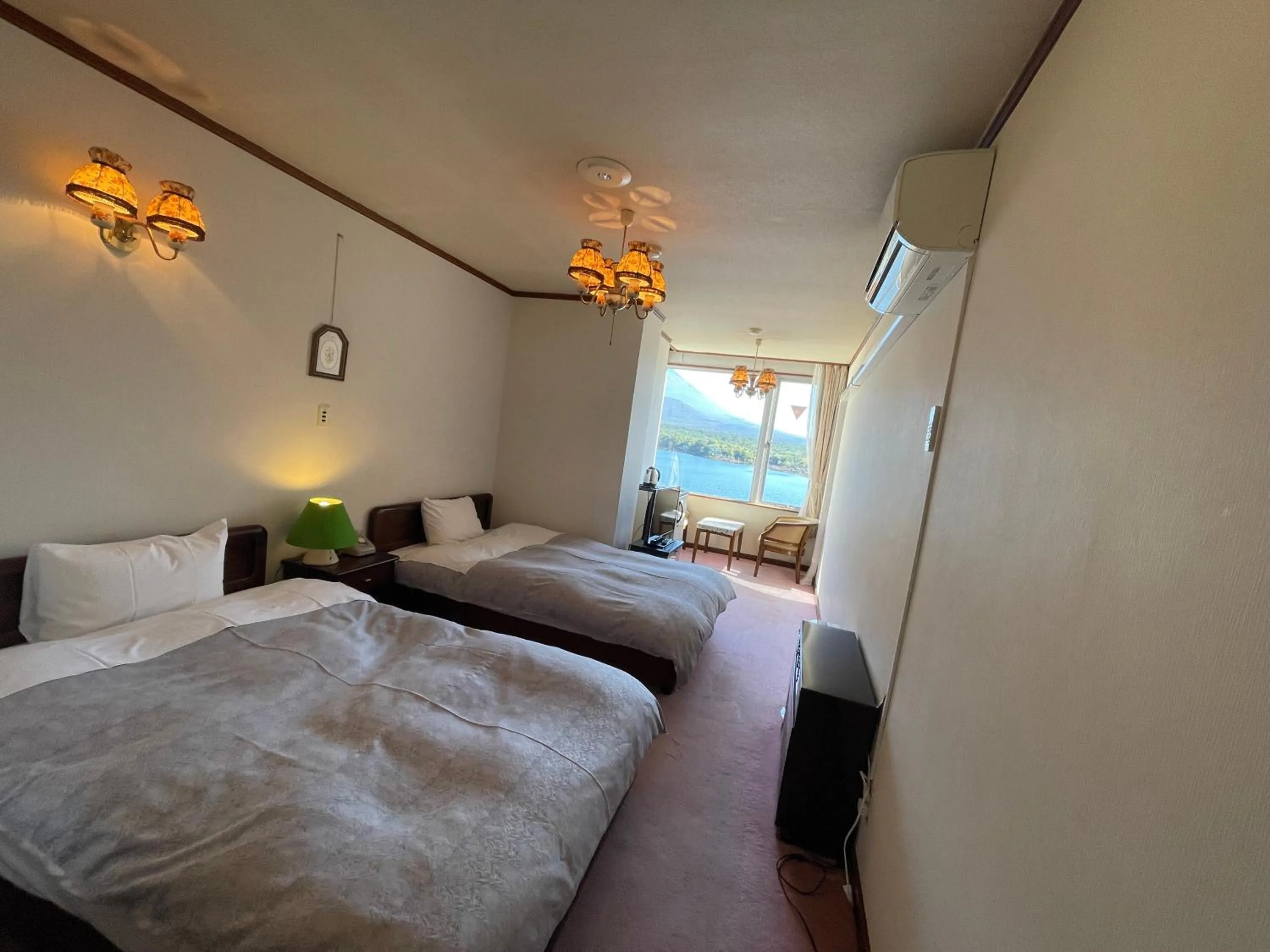 Bed in Shoji Lake Hotel