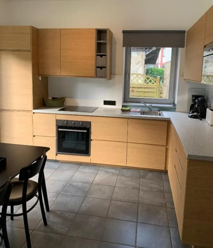 Kitchen or kitchenette in Hotel Aux Ecuries De La Reine