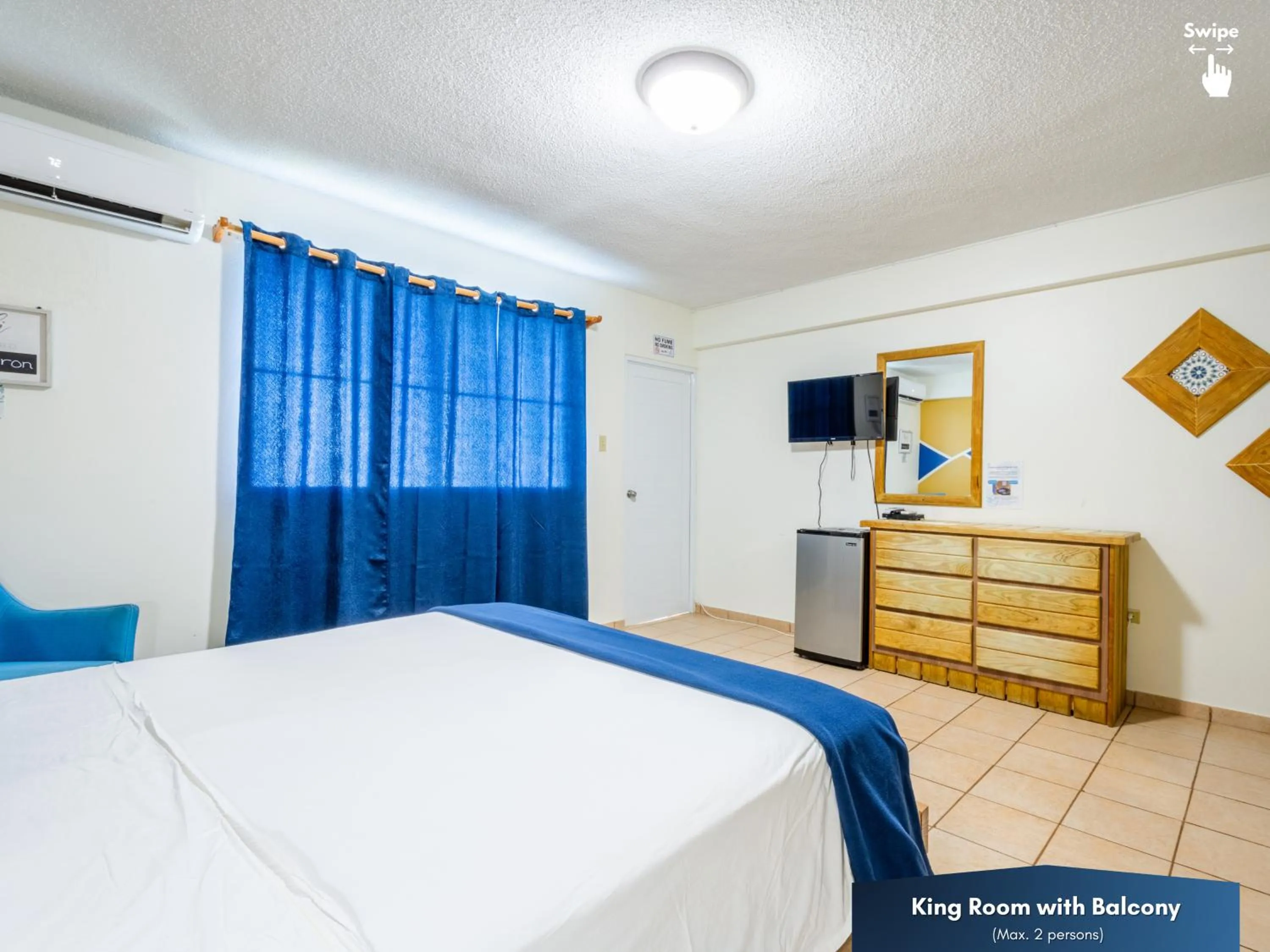 Bedroom in West Coast Inn's